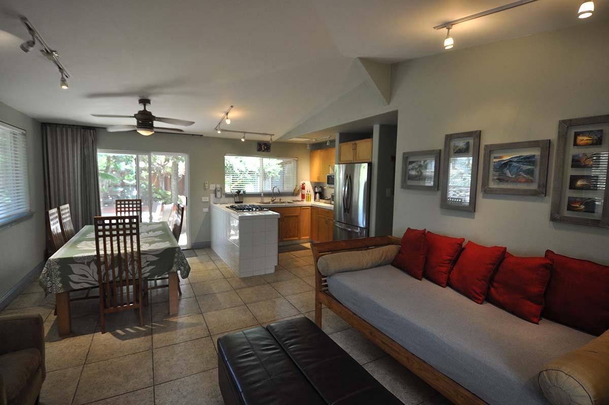 Living dining kitchen area overlooks gardens.