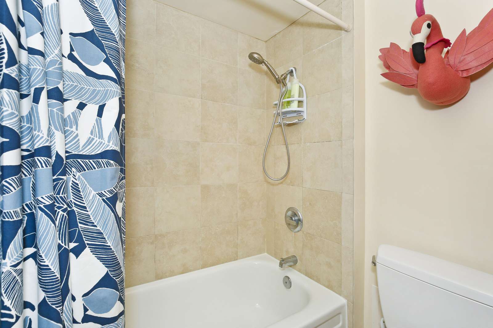 Shower/Tub combo with hand held shower.