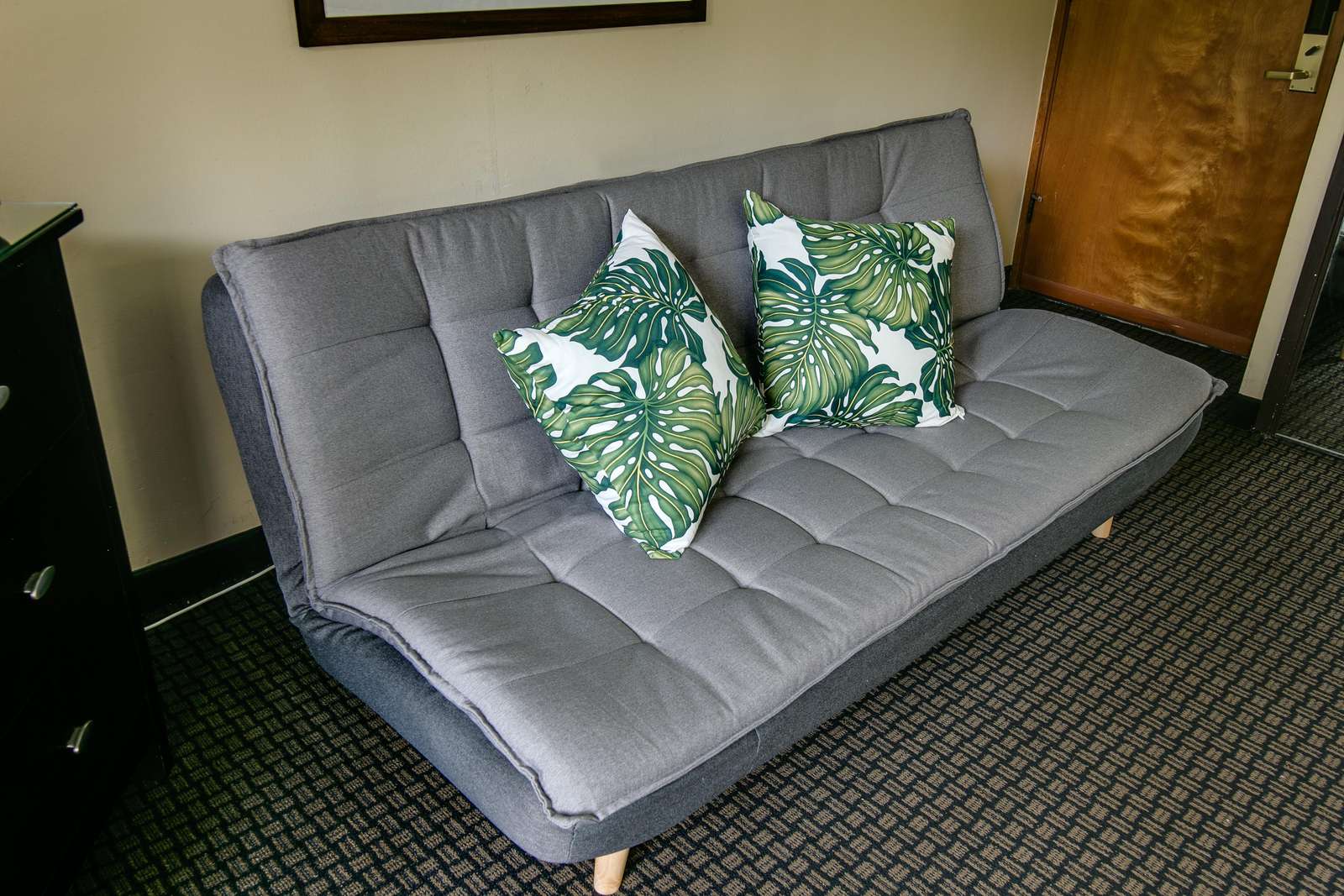 Brand New comfy Futon sleeps two - bedding provided