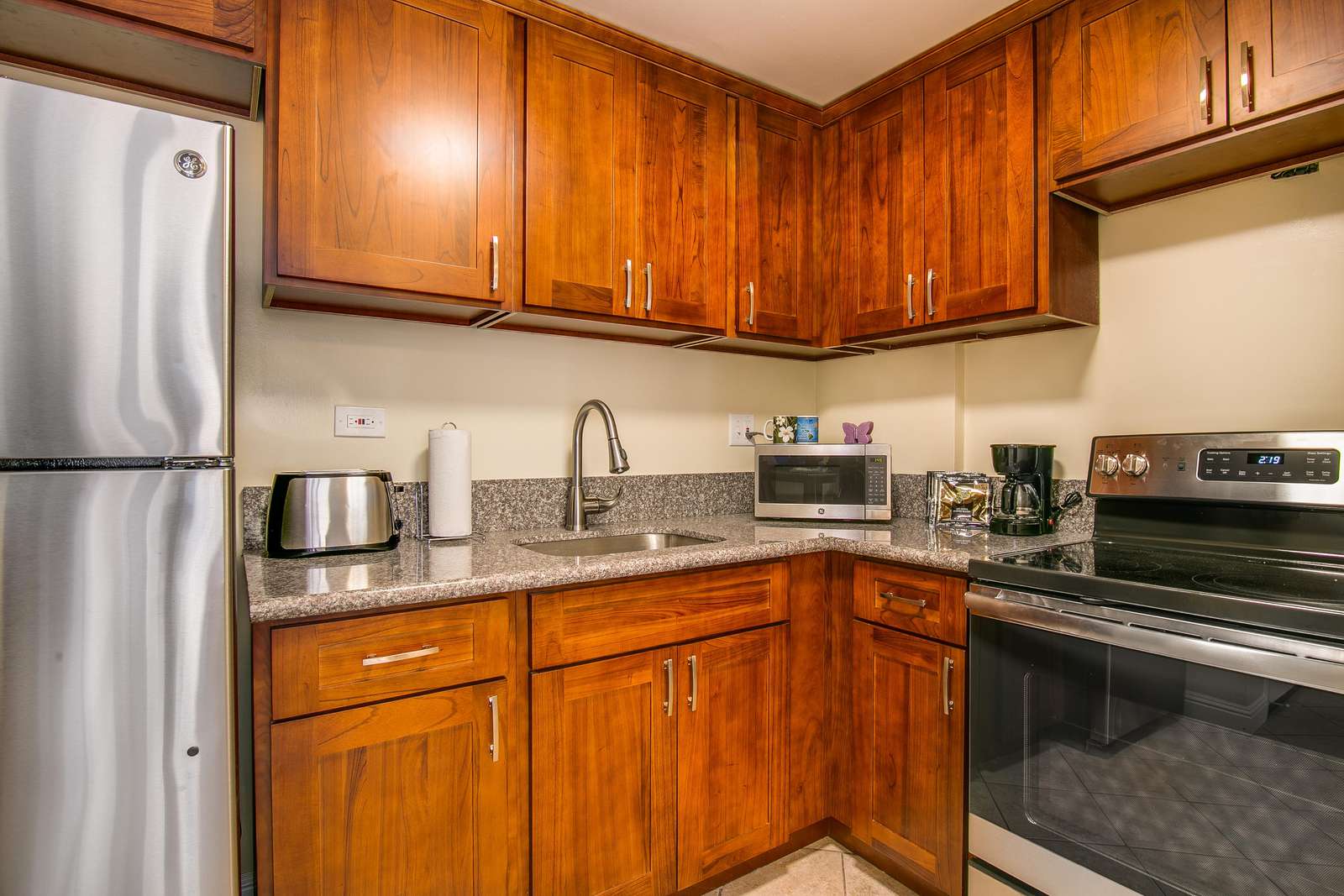 Brand new kitchen with marble counters and new appliances