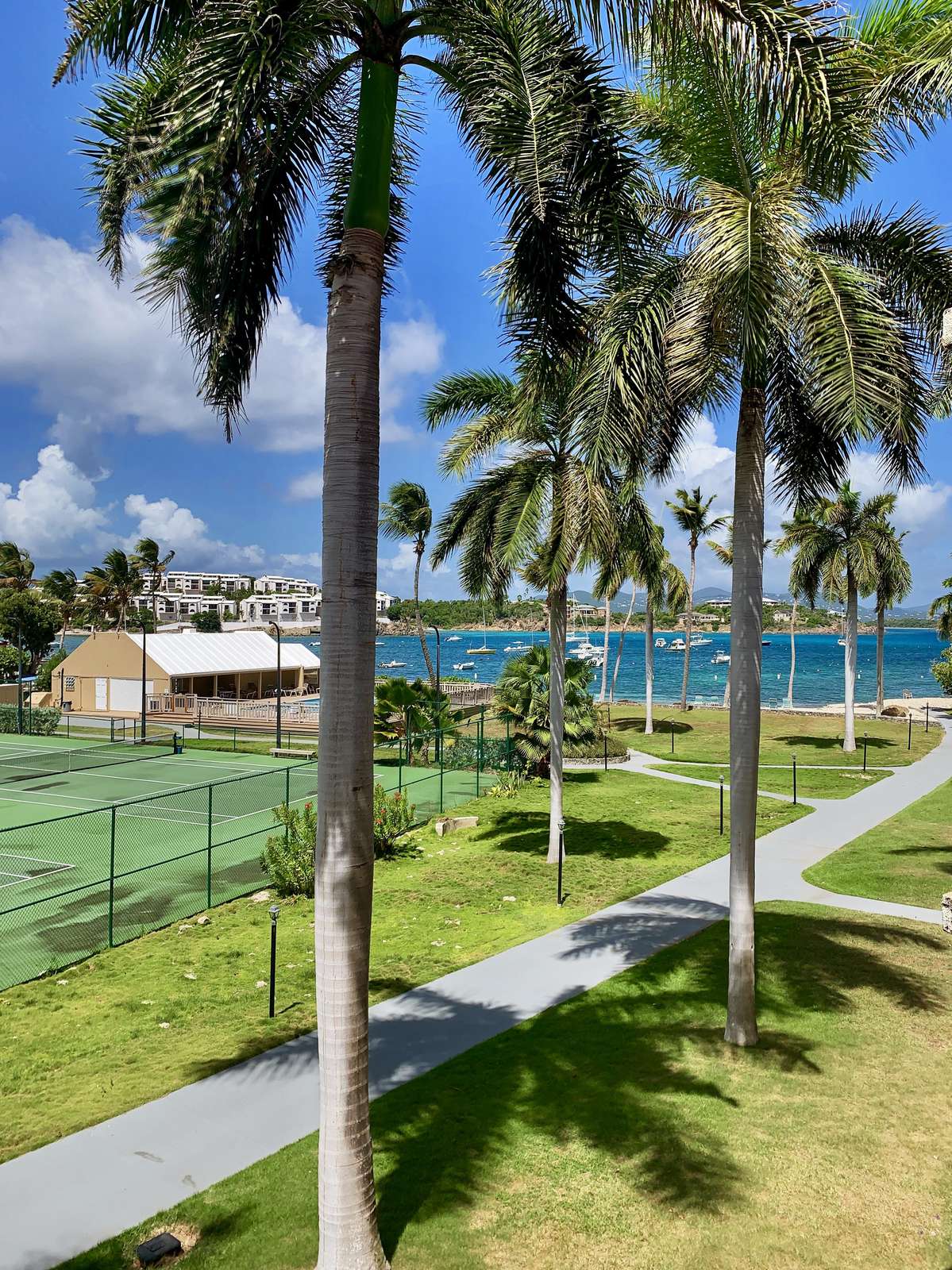 Views of the tennis court and pool
