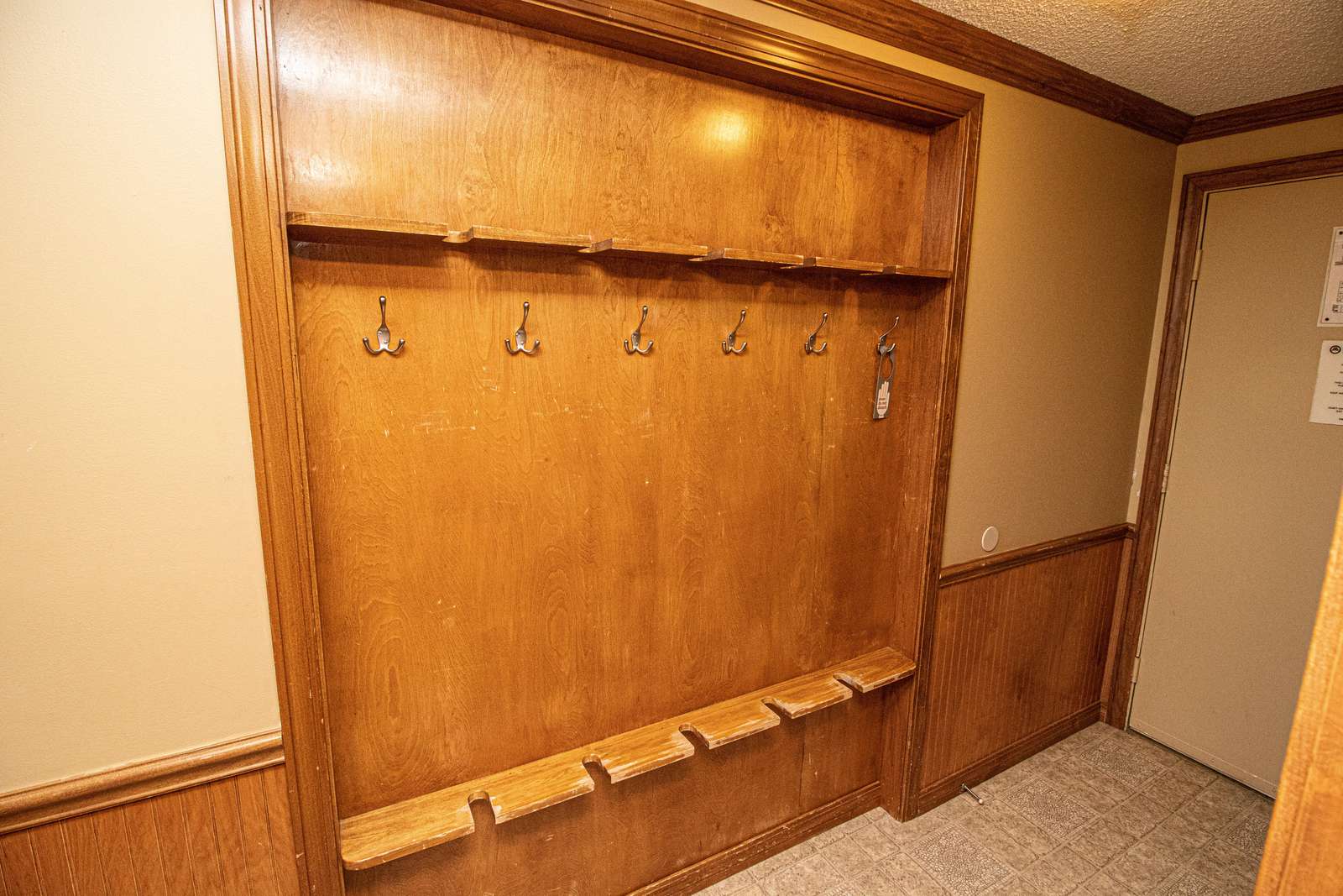 Recessed ski rack in hallway - securely store your gear inside the condo!
