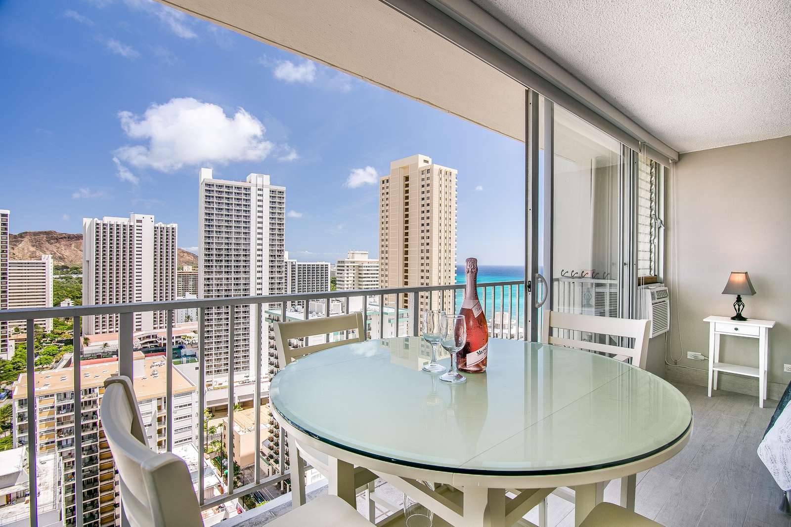 Dining area for four guests high above Waikiki
