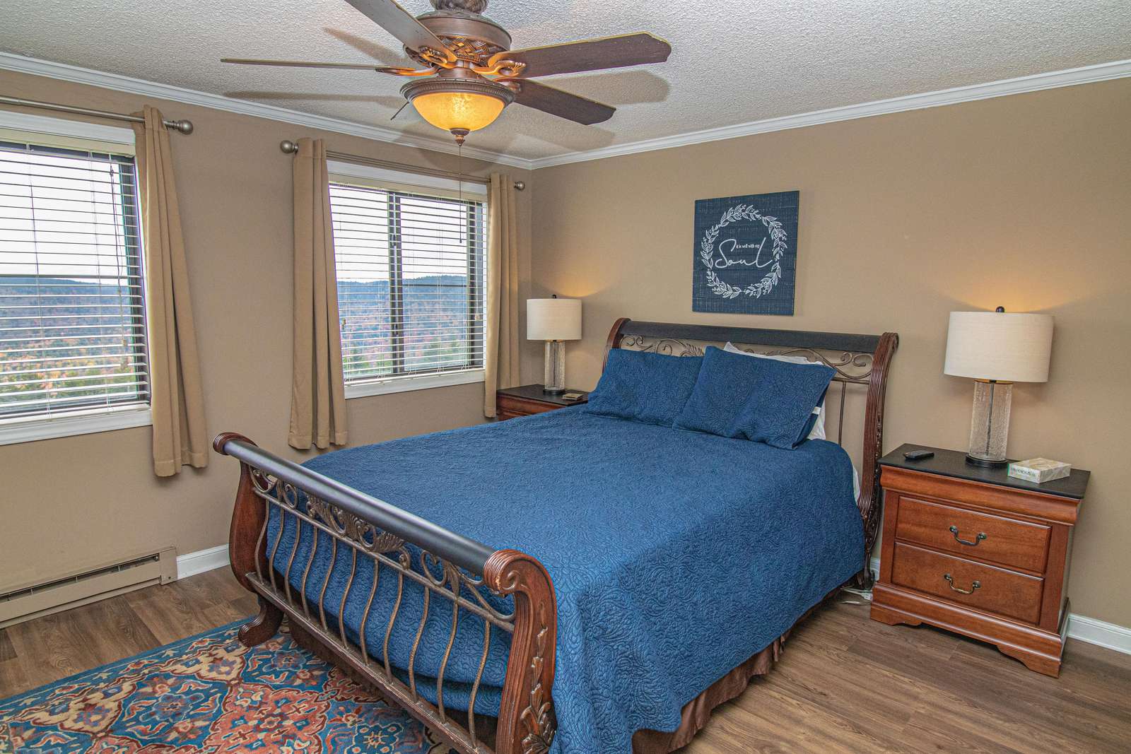 Queen-sized bed in master bedroom. Located on mountain side - NOT the hallway side of bldg!