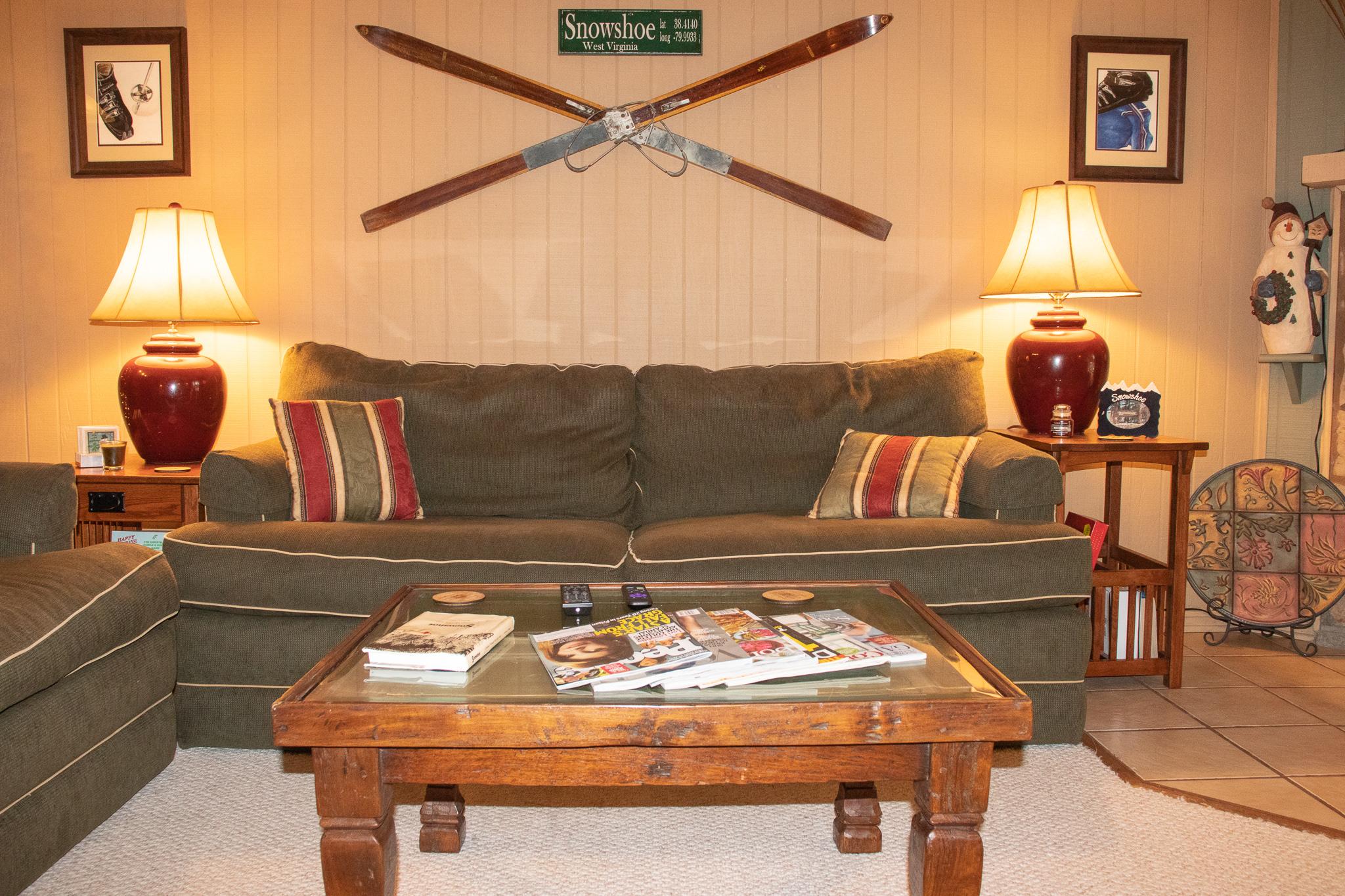 Roomy living room includes a pull-out sofa which sleeps two (2) additional people.