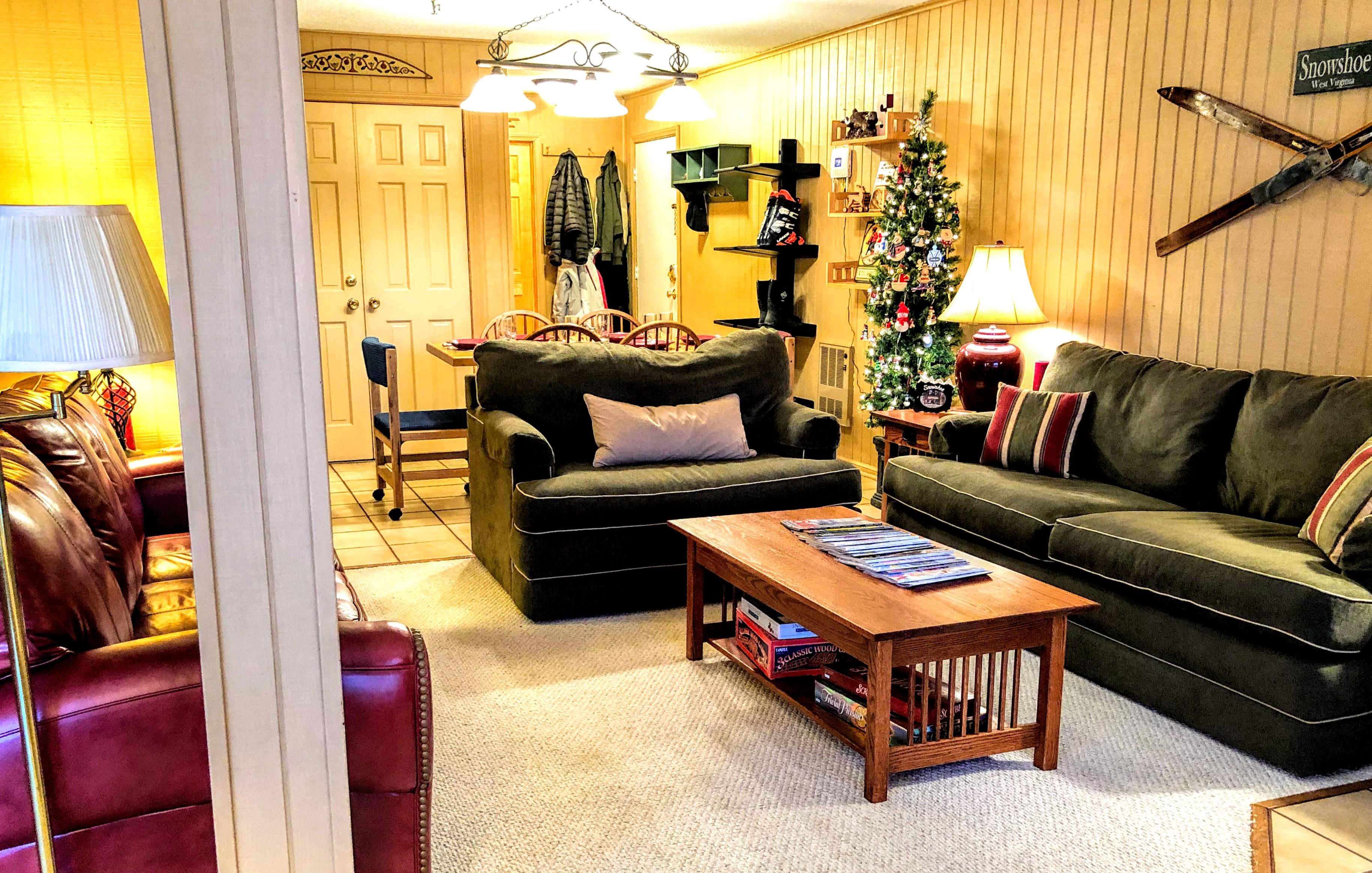 Plenty of room for the entire family! Two couches, love seat, and chair/footrest. Sit by the fire and watch TV!