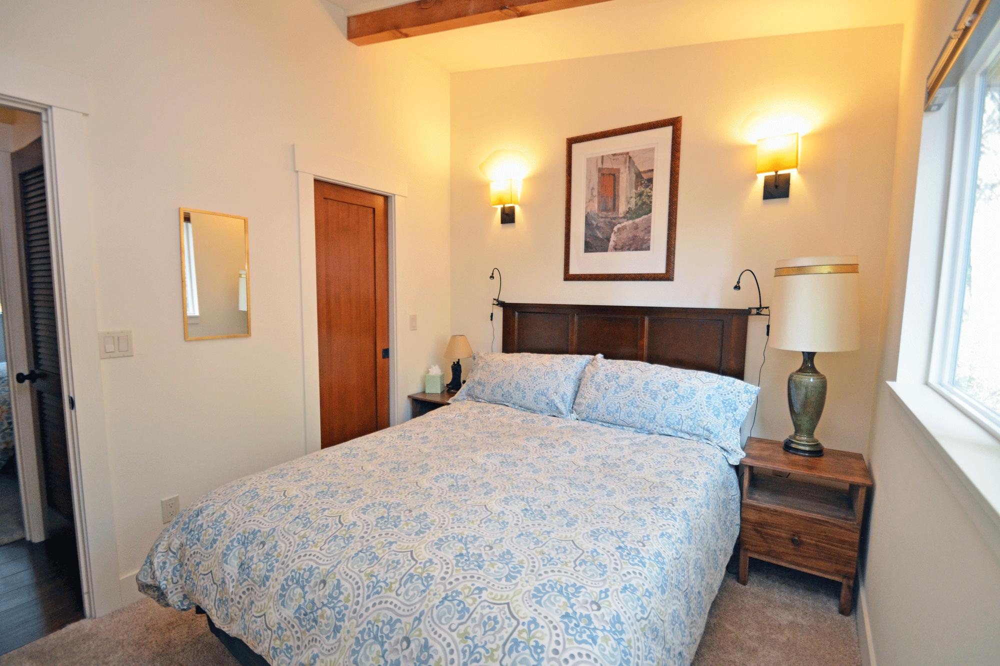 Queen size bed with down comforter