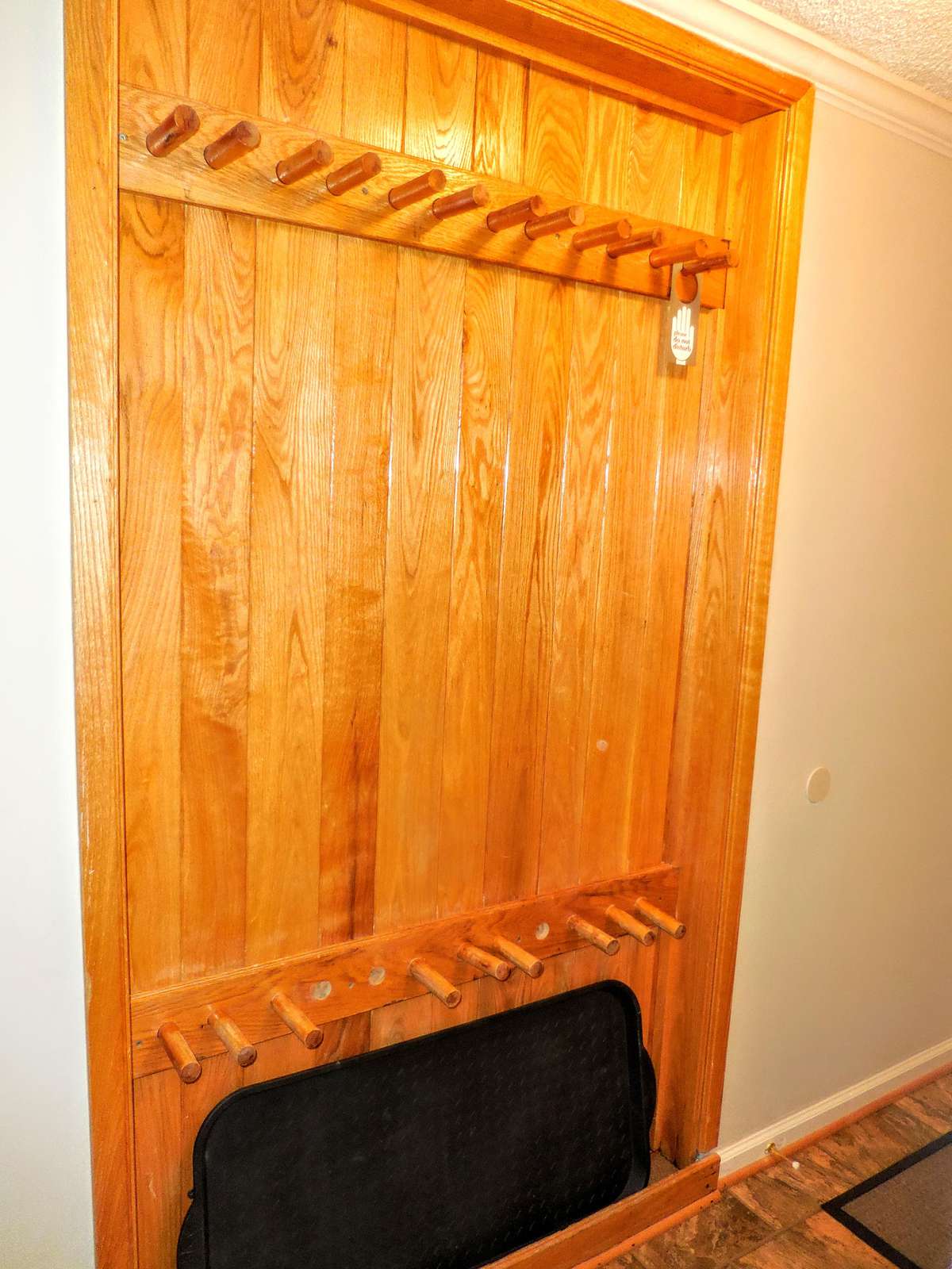 Recessed ski rack in hallway is a perfect location to safely store your gear indoors.