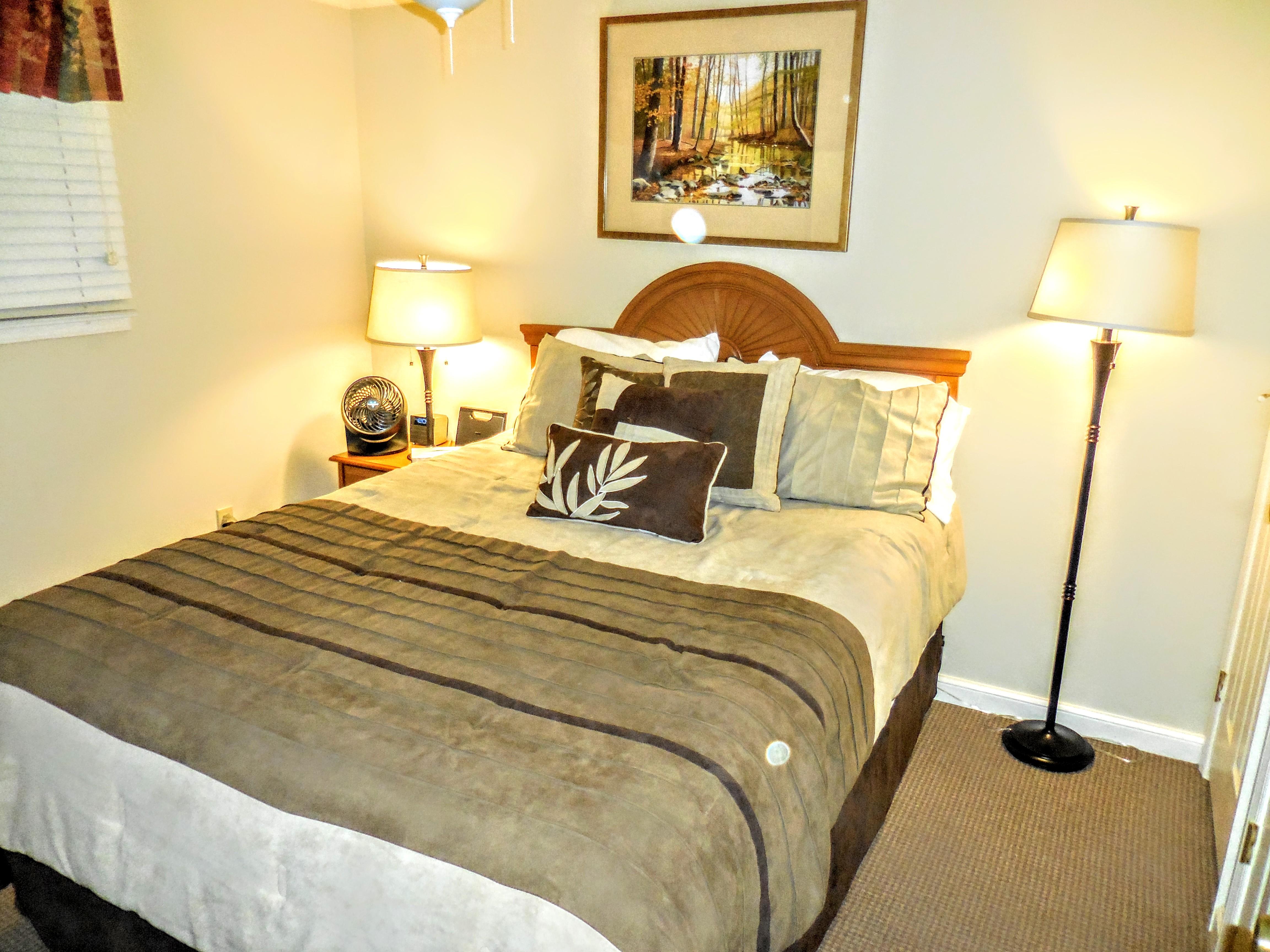 Queen-sized bed in second bedroom