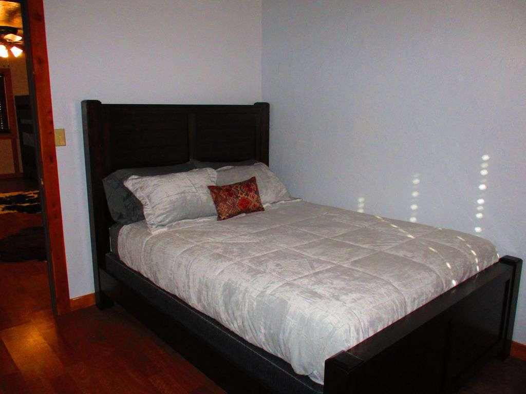 Queen bed in upstairs bedroom