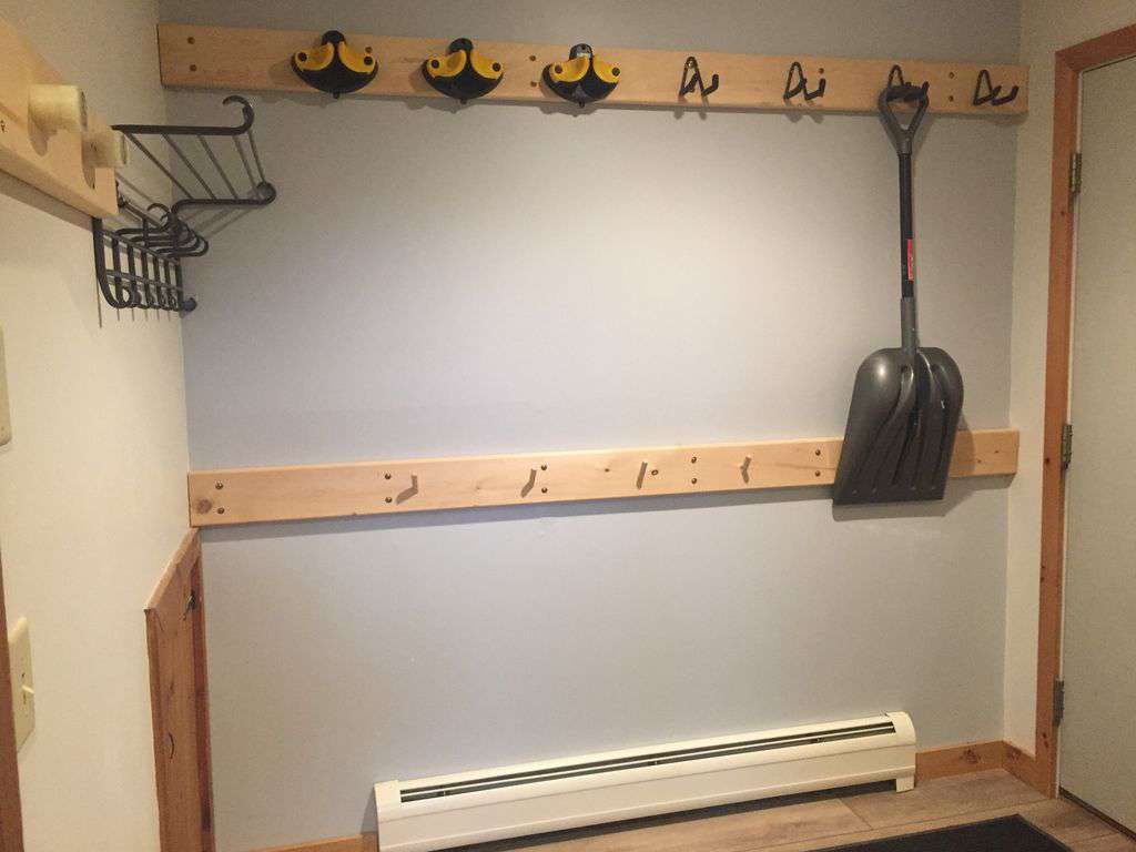 mudroom entrance with plenty of room for coats, boots, and skis
