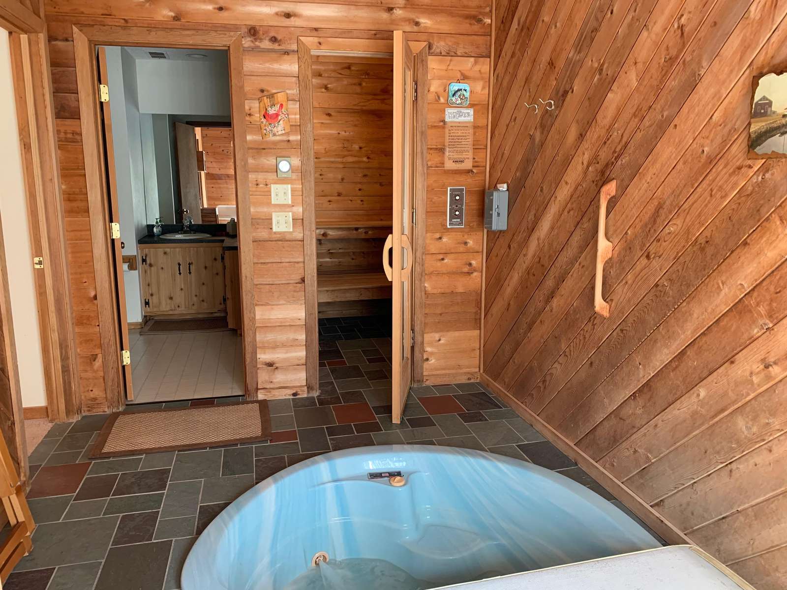 hot tub, sauna and bathroom, main floor