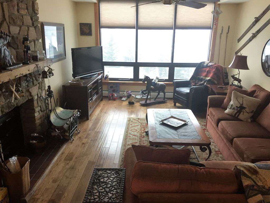 cozy living room and views of Mount Snow