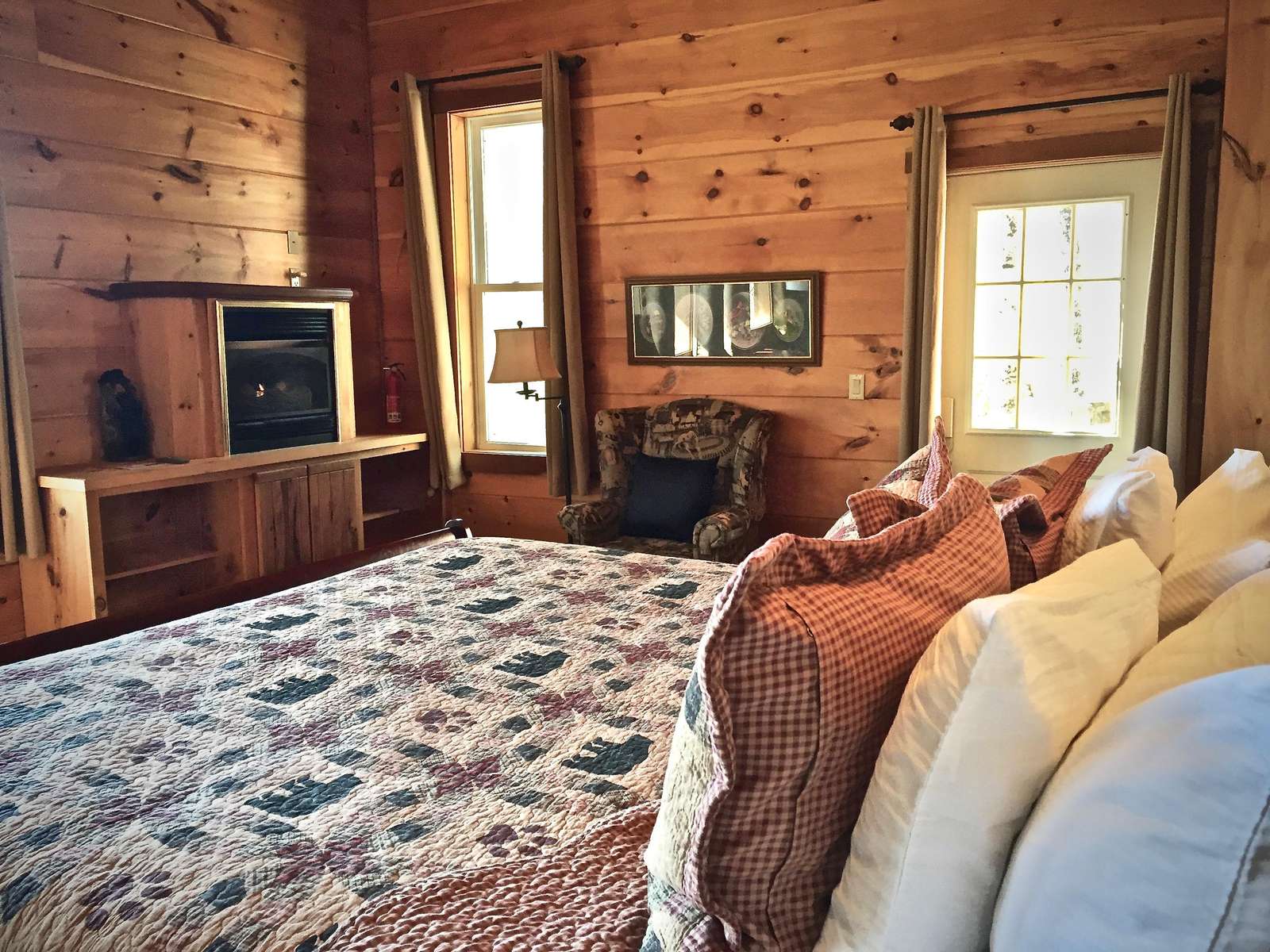 King Bed offers Pillow Top Mattress, Luxury Linens and Bedding, and the second Fireplace