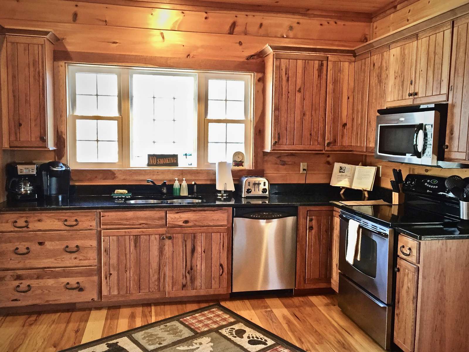 Kitchen is Thoughtfully Stocked and Tastefully Designed. (Did we mention there is a Waffle Maker)?