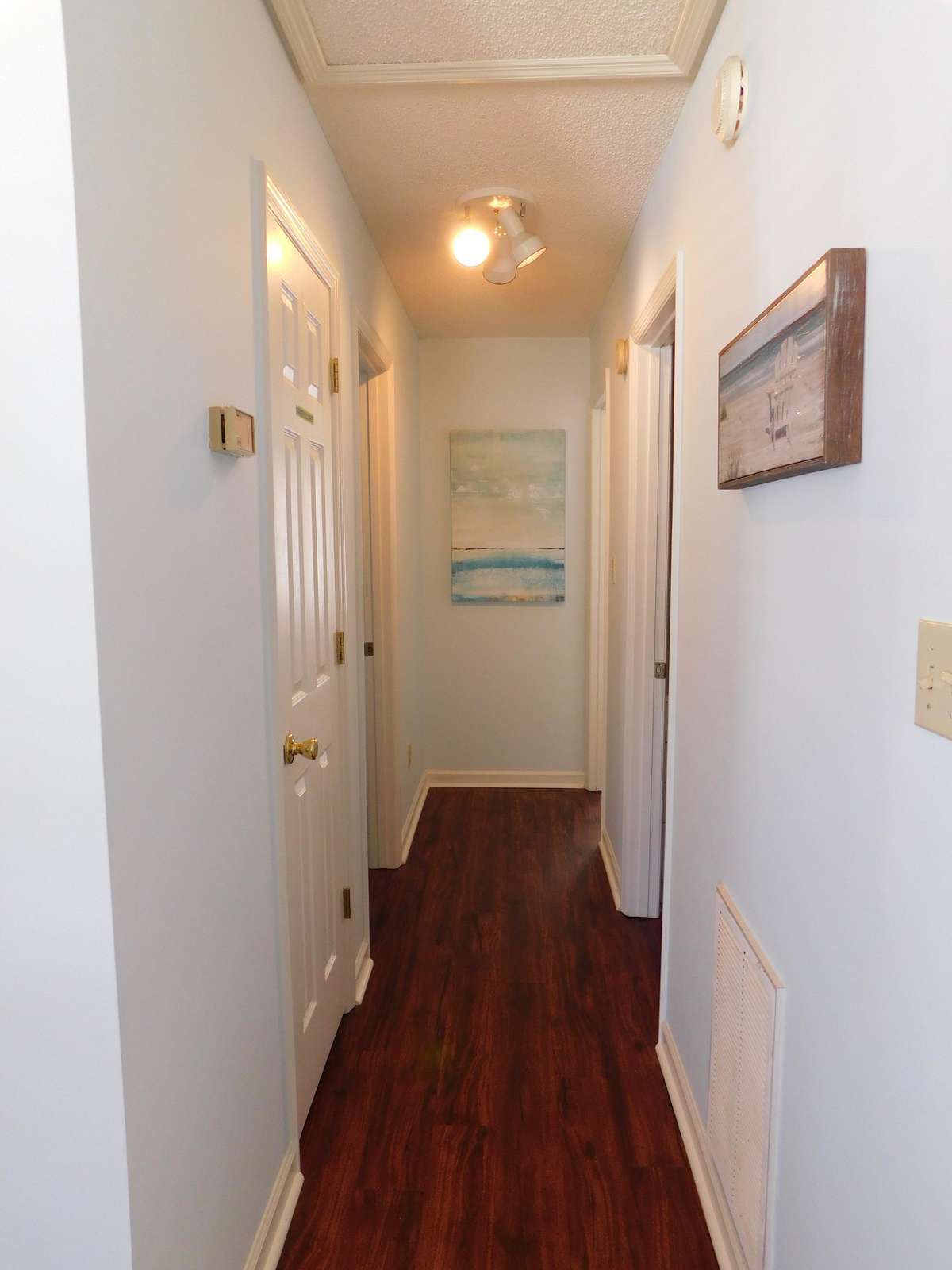Hall to bedrooms Master on Left with Bath