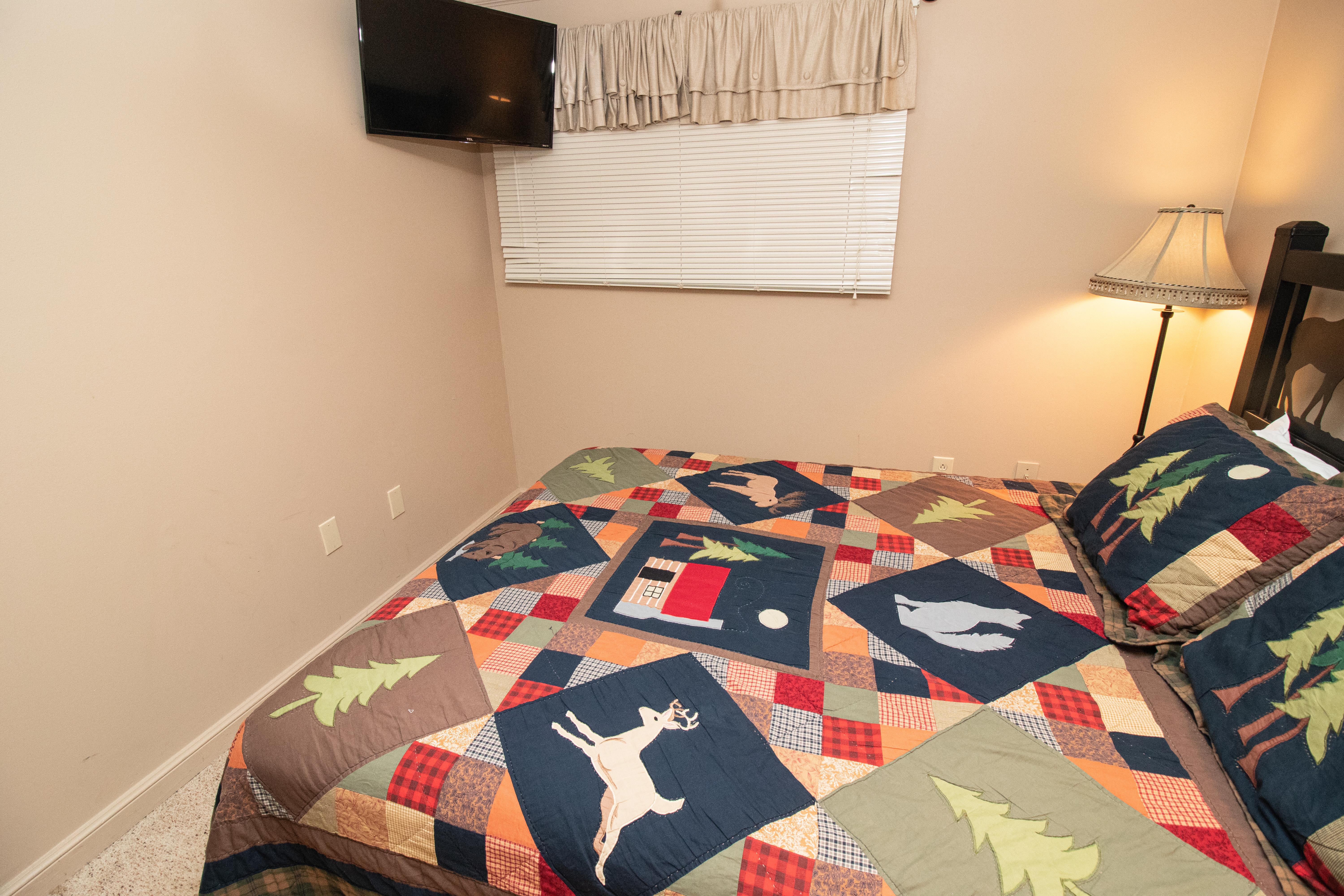 Flat screen TV in bedroom; free DISH Network channels.
