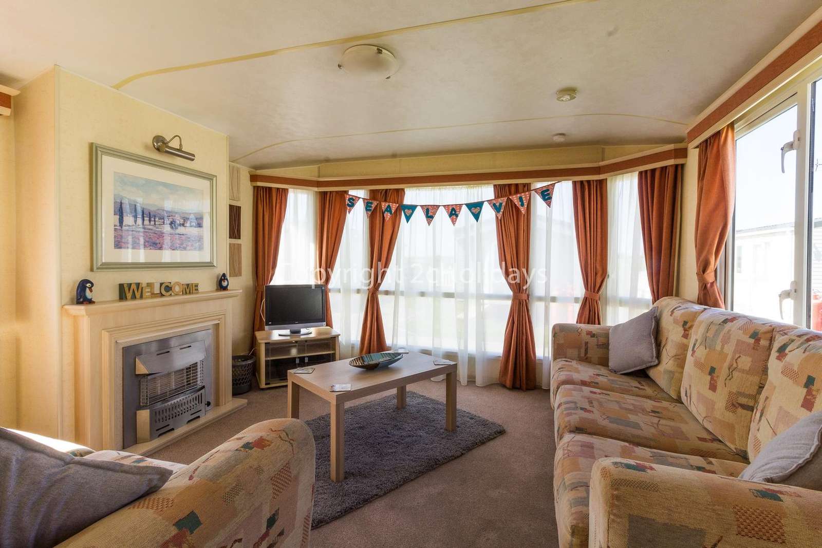 Light and airy lounge with a TV and gas fire!