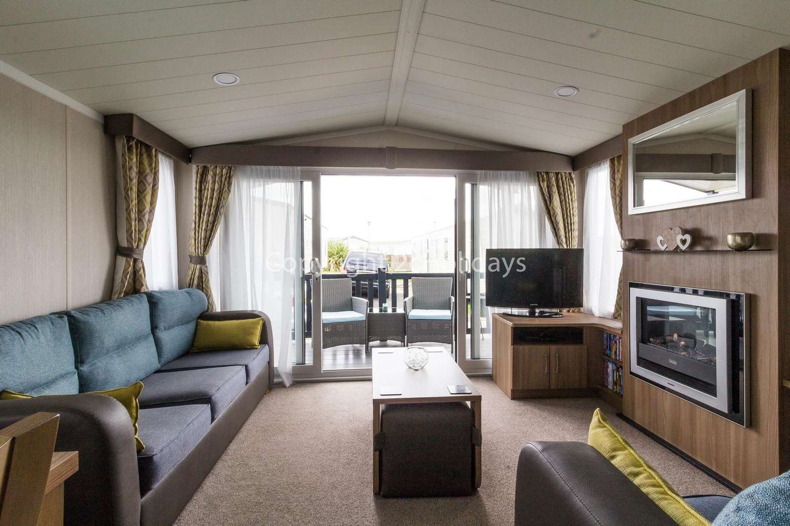 Beautiful French doors leading to the decking area!