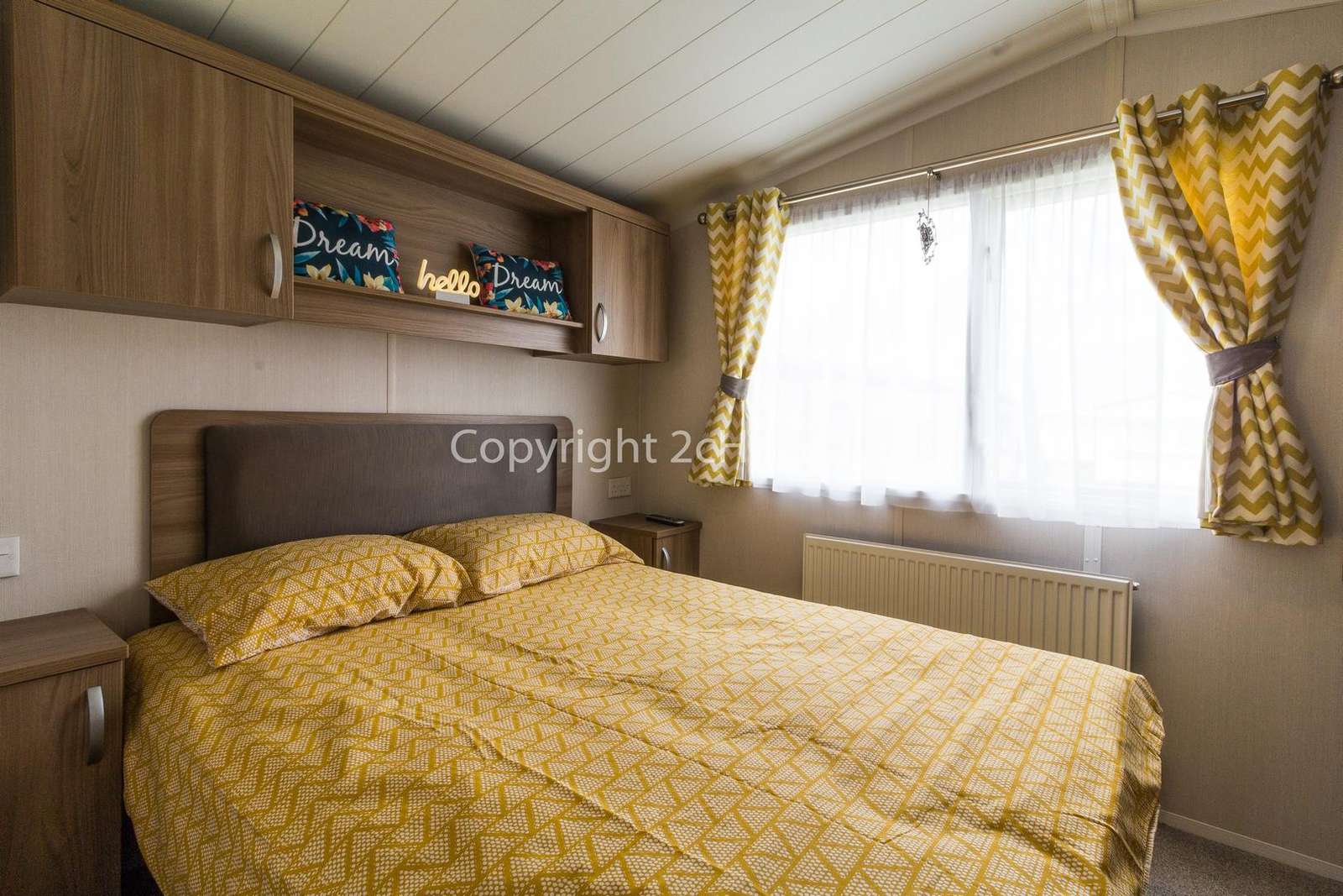 Beautiful master bedroom with a TV!