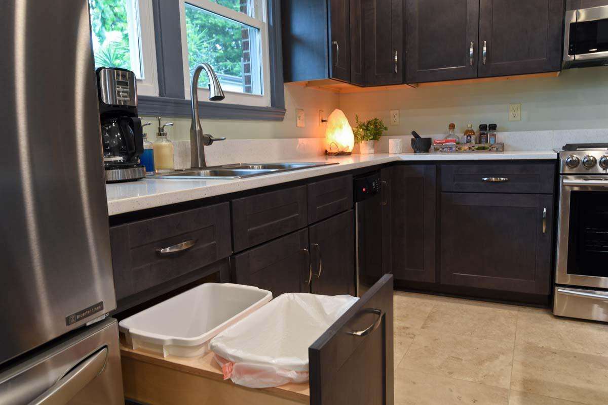 Dual rubbish & recycle bins built into cabinets