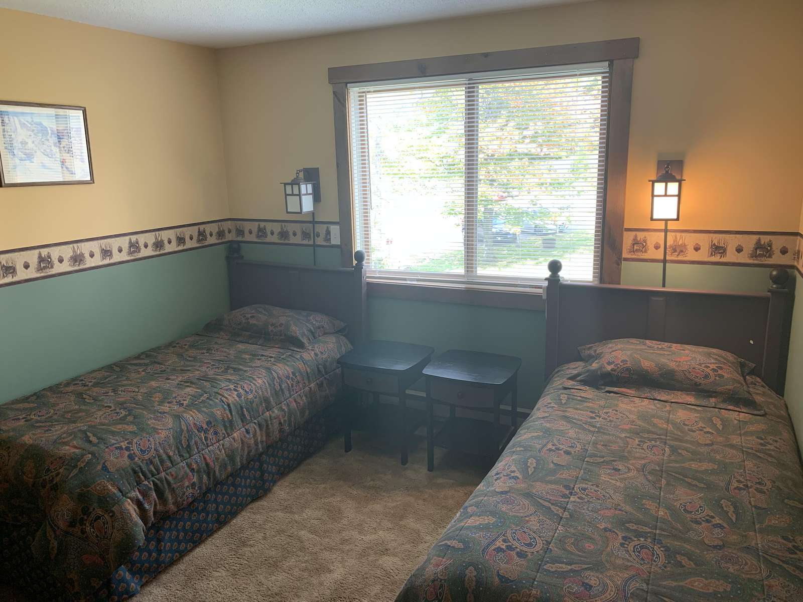 upstairs bedroom with twin beds