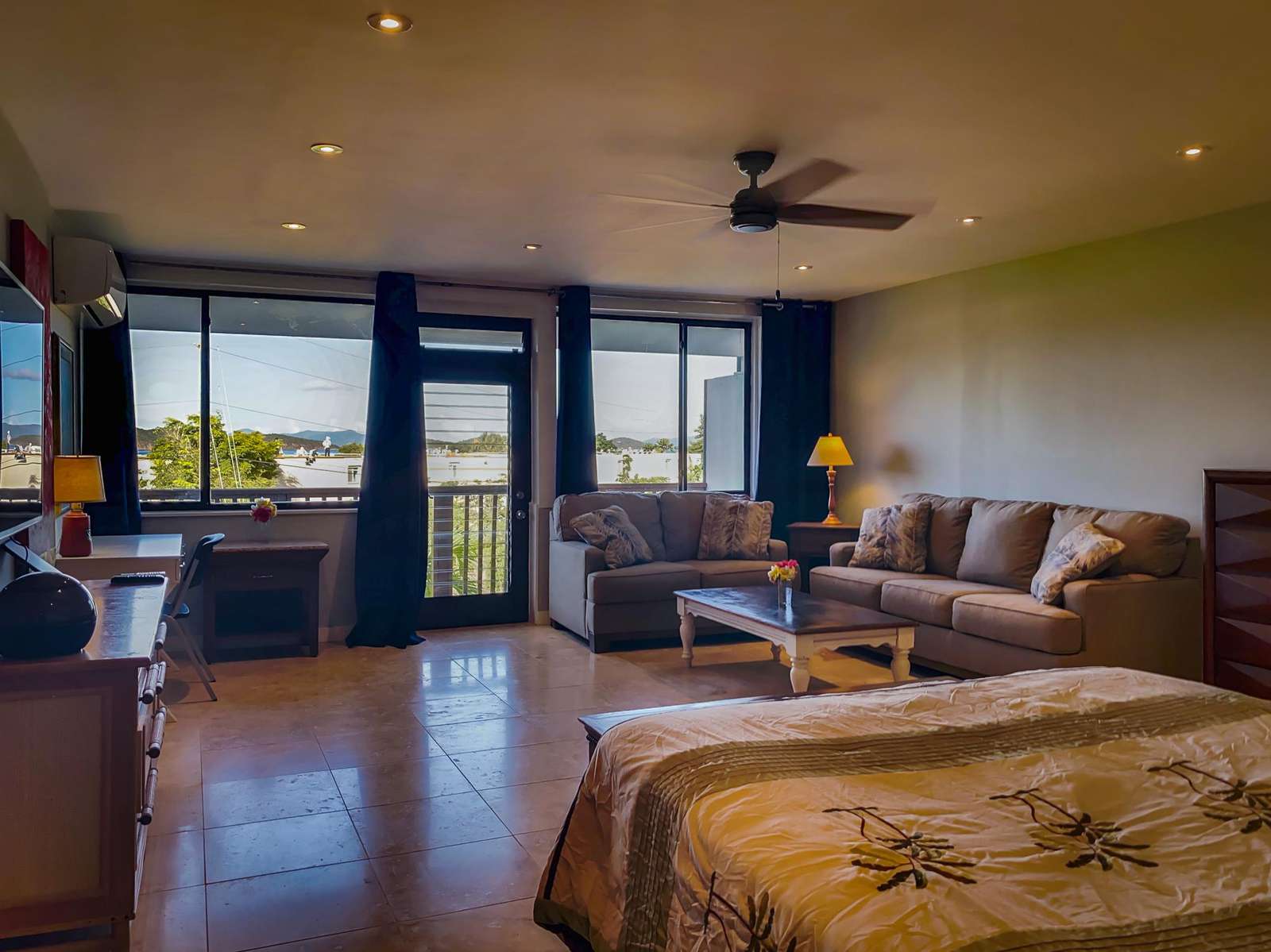 A spacious living area with comfortable furnishings