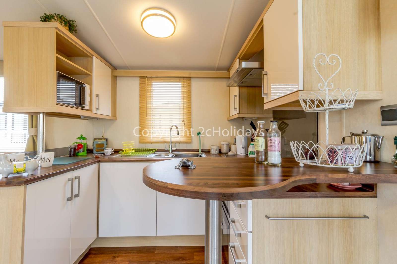 Mini breakfast bar provides a modern feel and additional seating