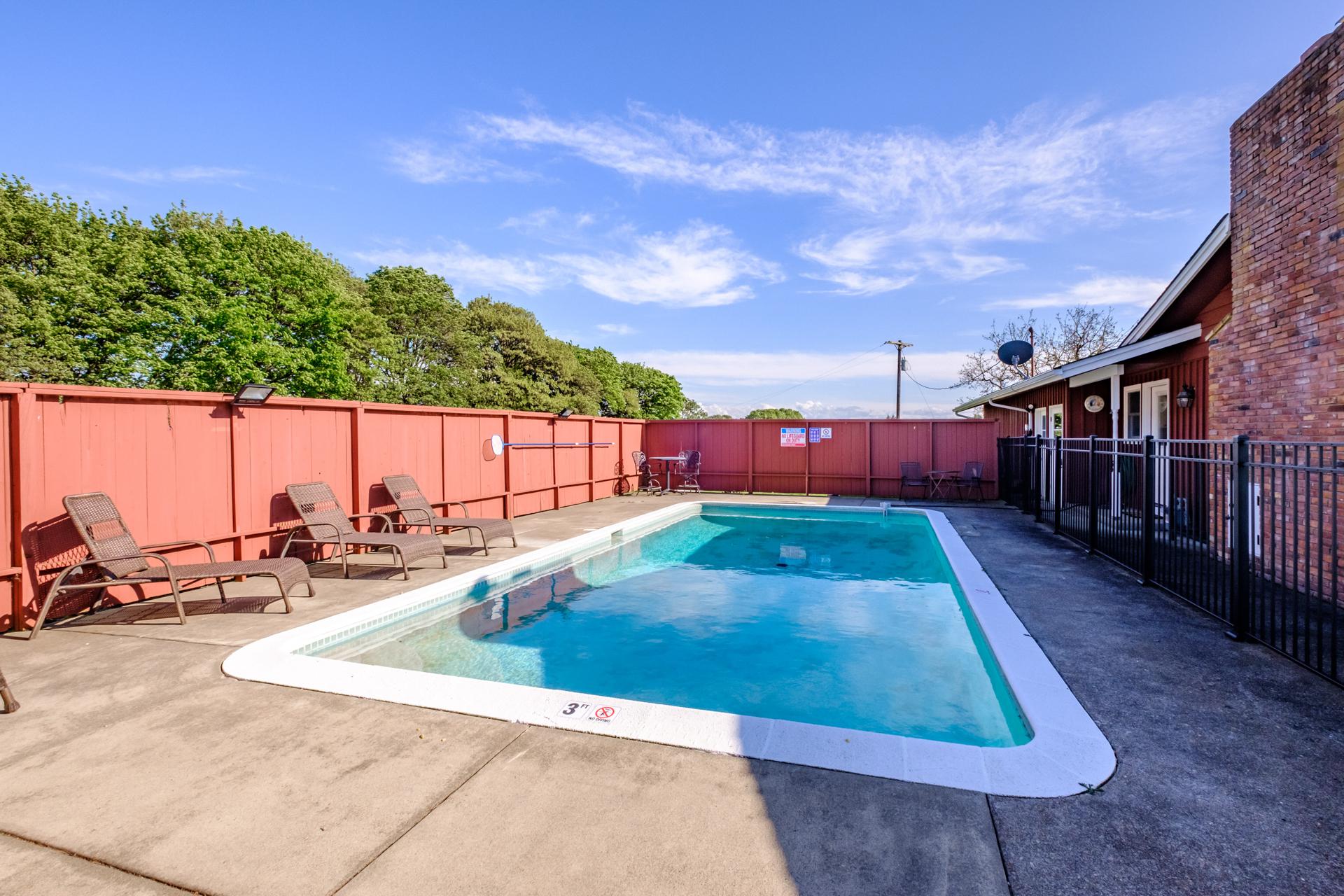 Pool with a surround safety gate.