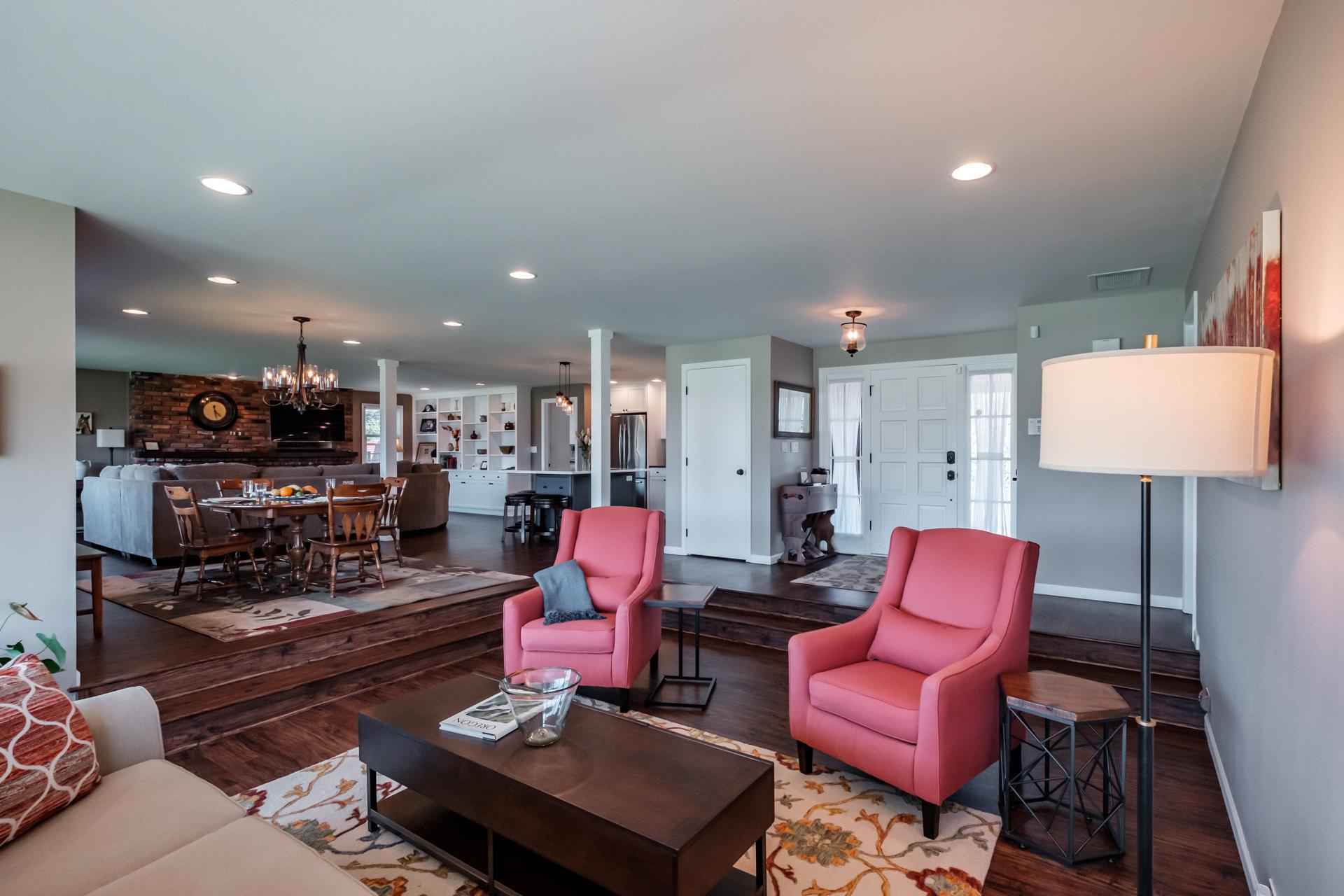 Stepping into Highland Acres - Front door view into sunken living room