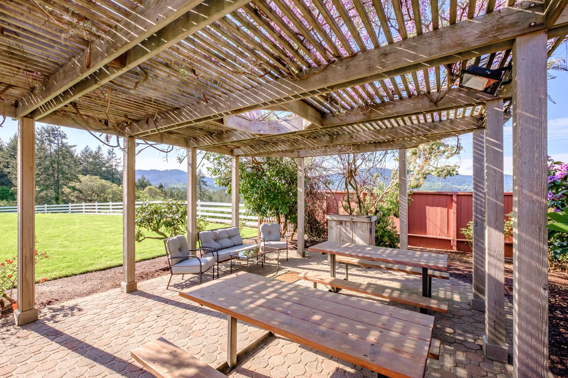 Pergola looking out to Vineyard Mountain.