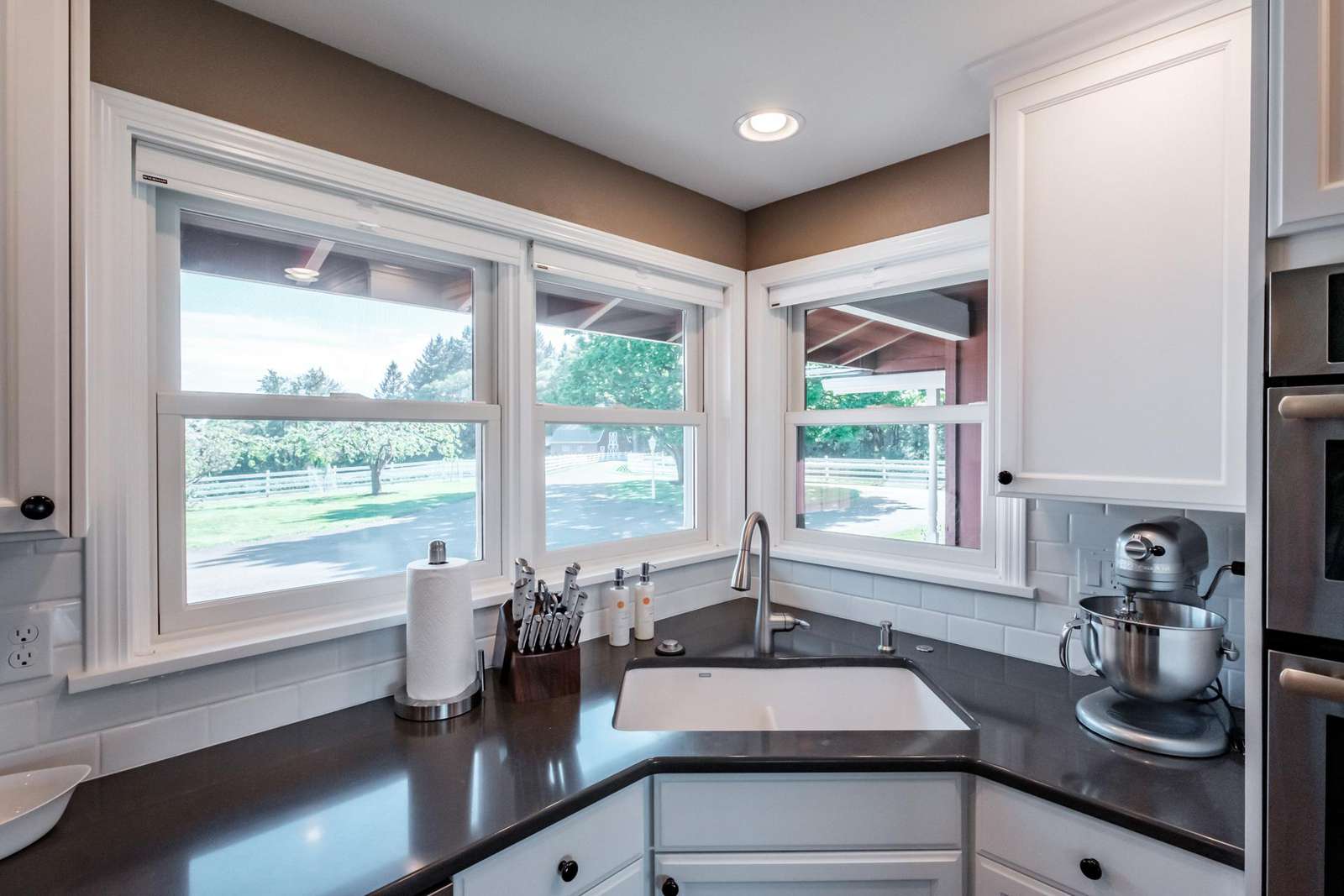 Kitchen sink - Great view of the barn and front of the property.