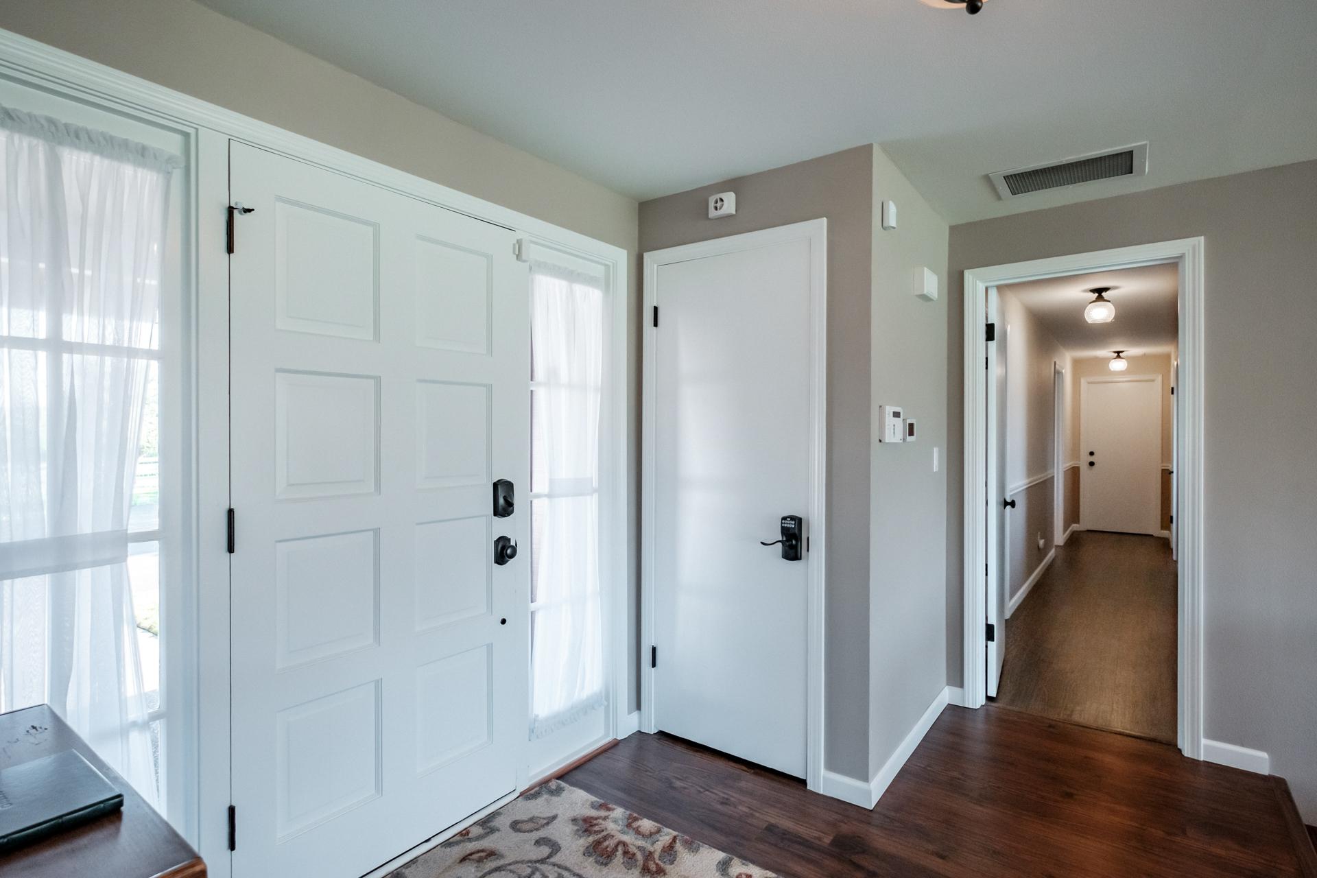 Entrance landing and hallway to bedrooms.