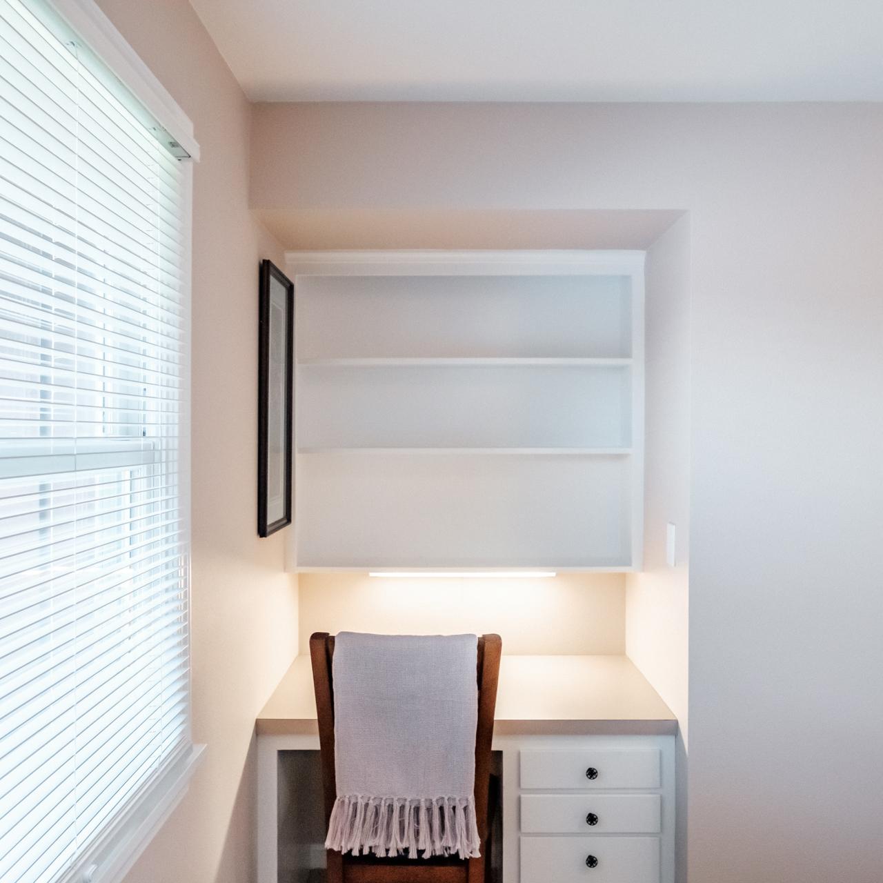 Bedroom 1 - computer desk areas with table light.