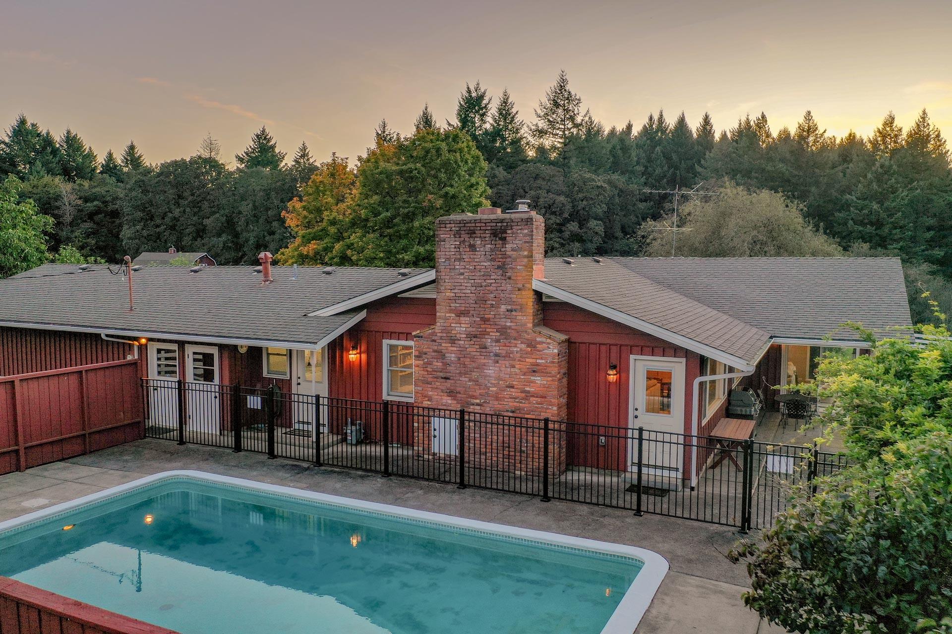 Highland Acres - The backyard has a swimming pool and pergola or entertaining.