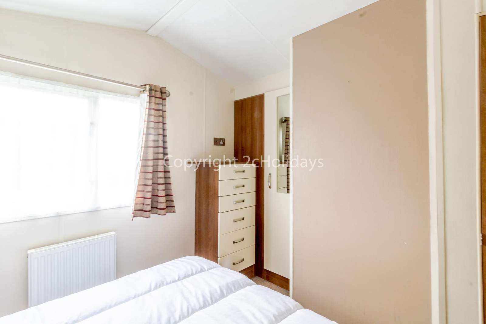 You can find plenty of storage in this master bedroom!