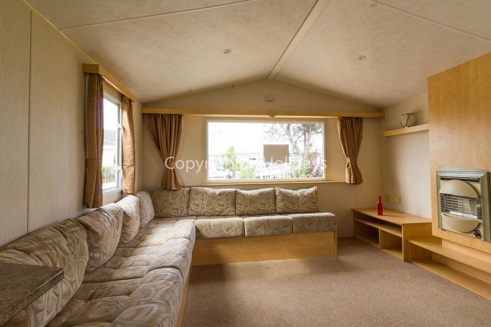 Spacious lounge area with a double sofa bed