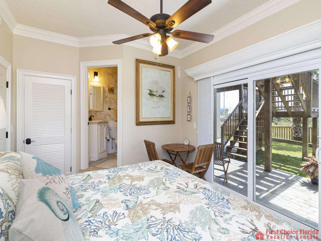 Oyster House Bedroom with Bathroom and Patio Access