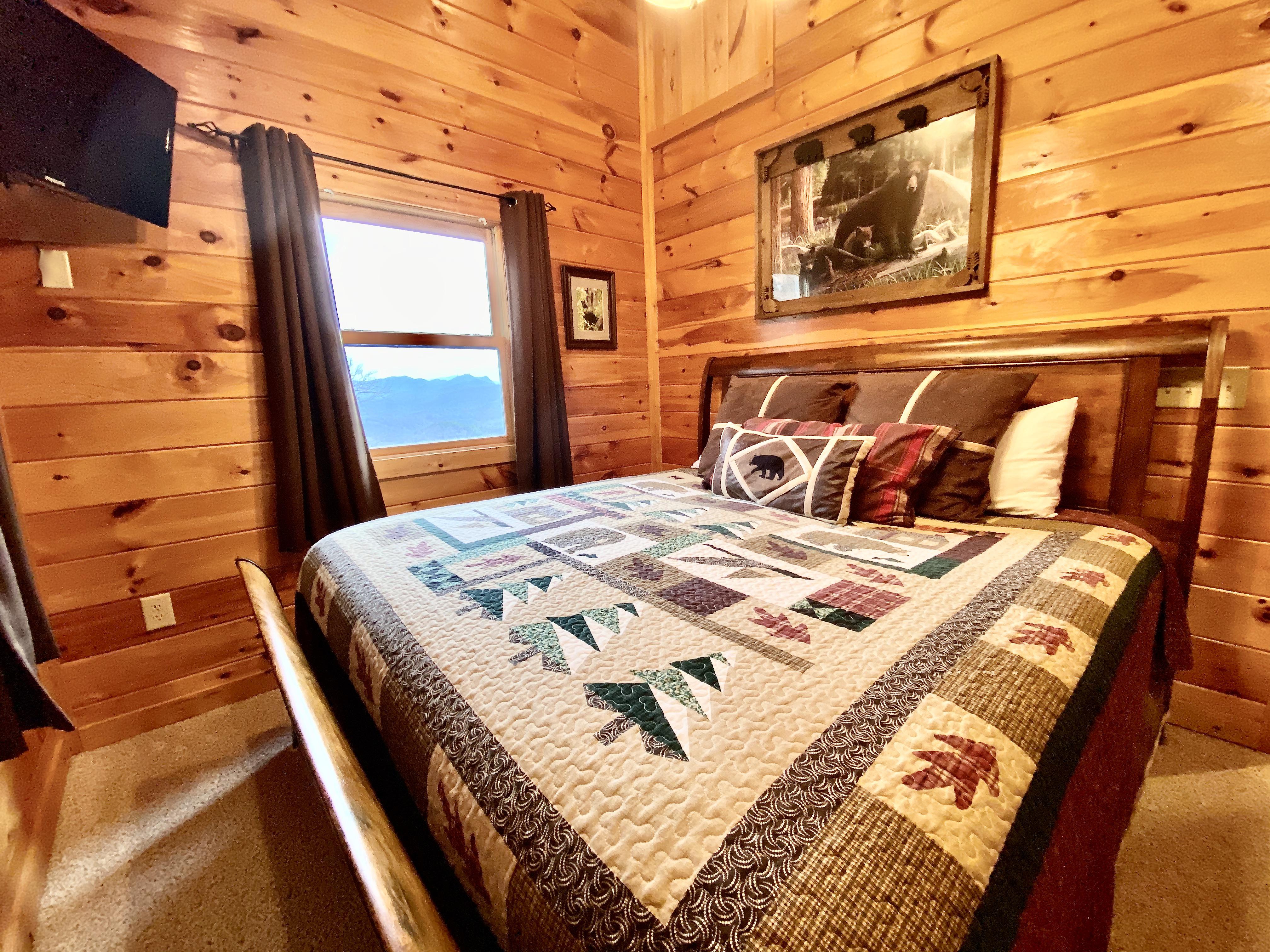 King Bedroom on the upper level offers a Private Deck and Flat Screen TV