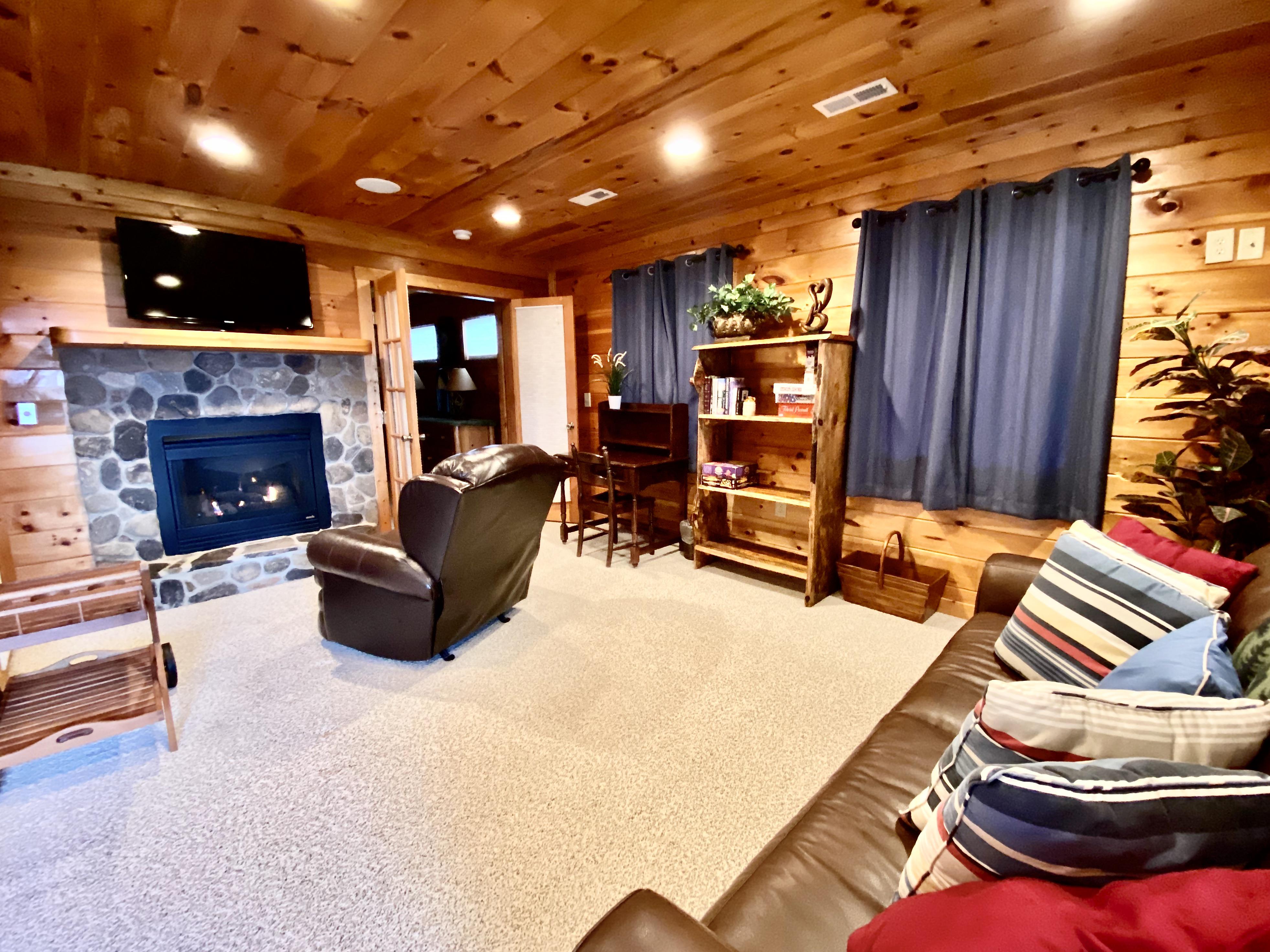 Master Bedroom Level includes a second Living Area with a Cozy Fireplace and Flatscreen TV