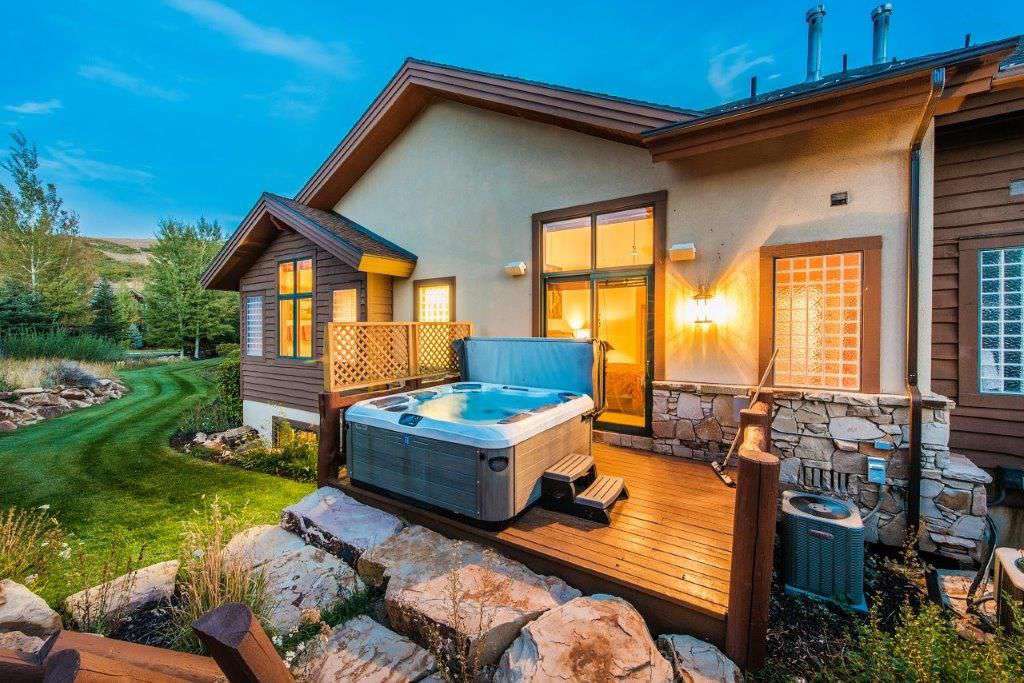 Open Space in backyard and giant hot tub