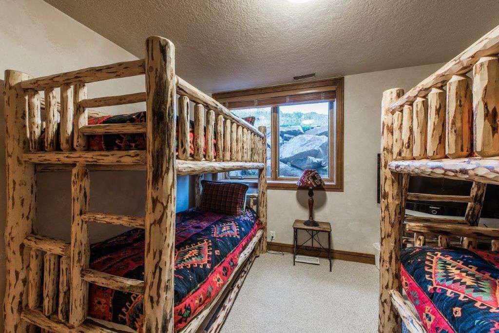 Lower level bunk room connects to a game room