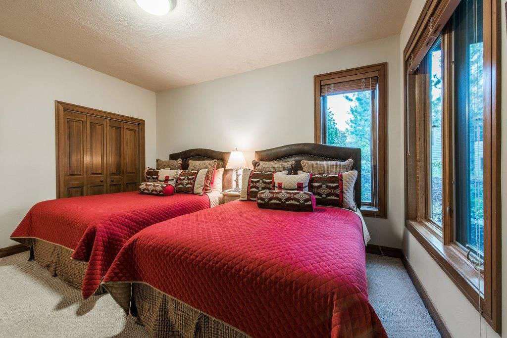 Bedroom on lower level with 2 Queens