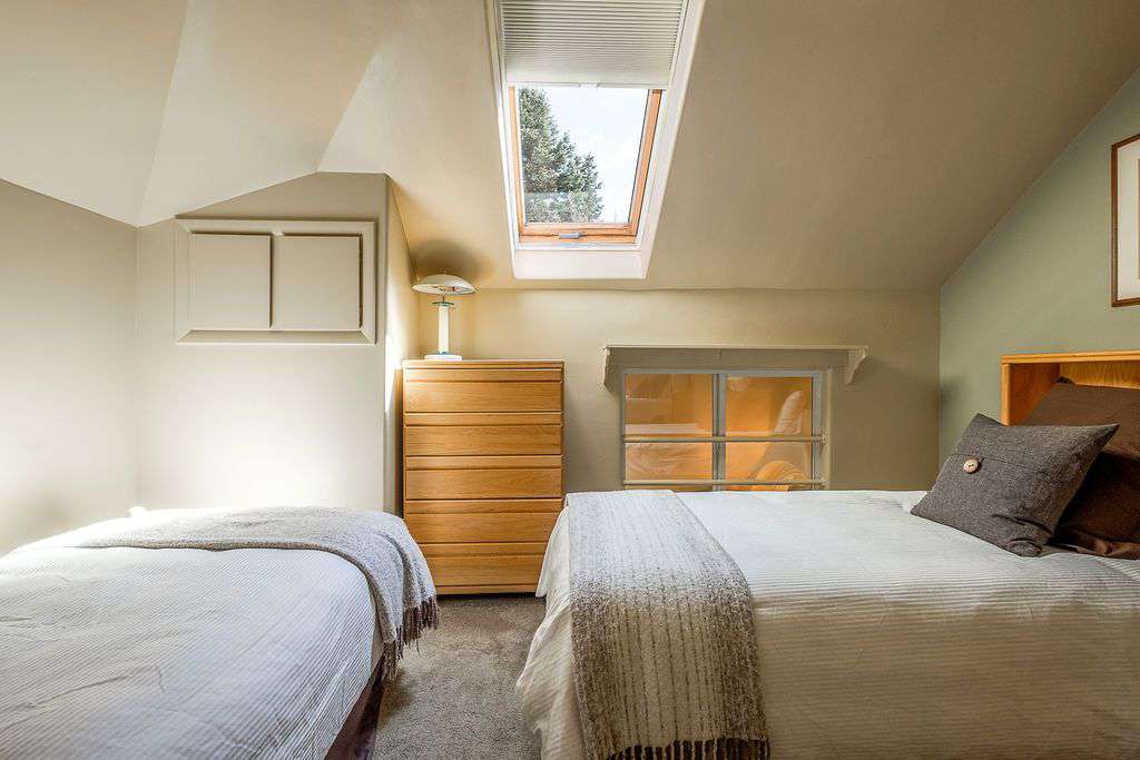 Fourth floor bedroom with skylight window