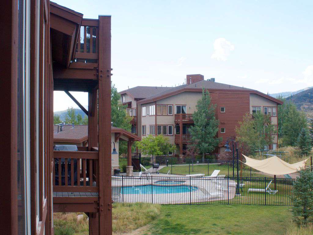 View of pool area from condo deck