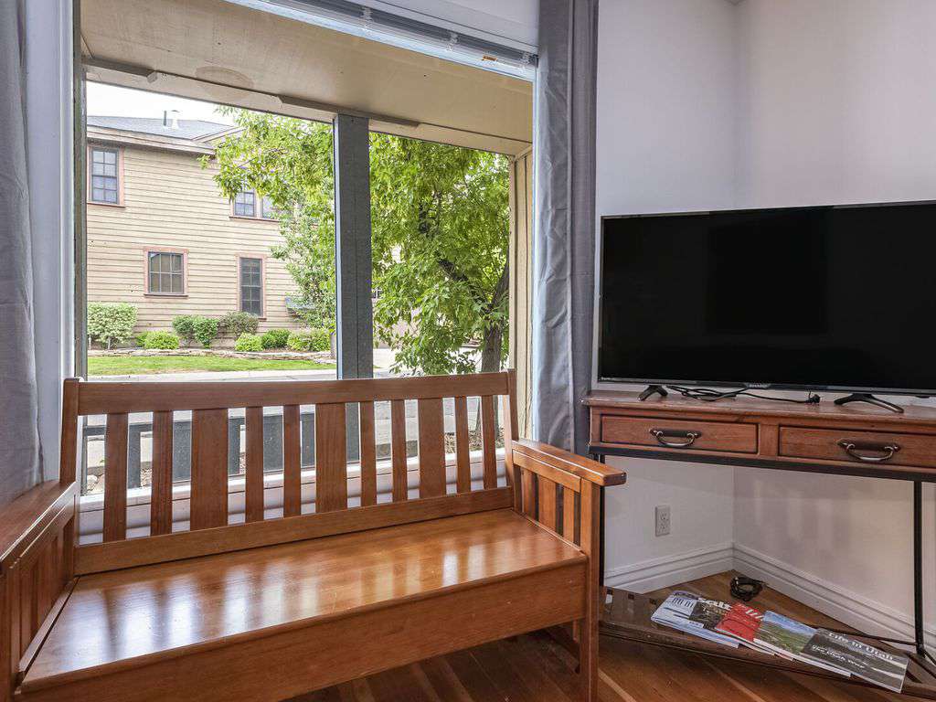 Large windows throughout, smart TV in living room