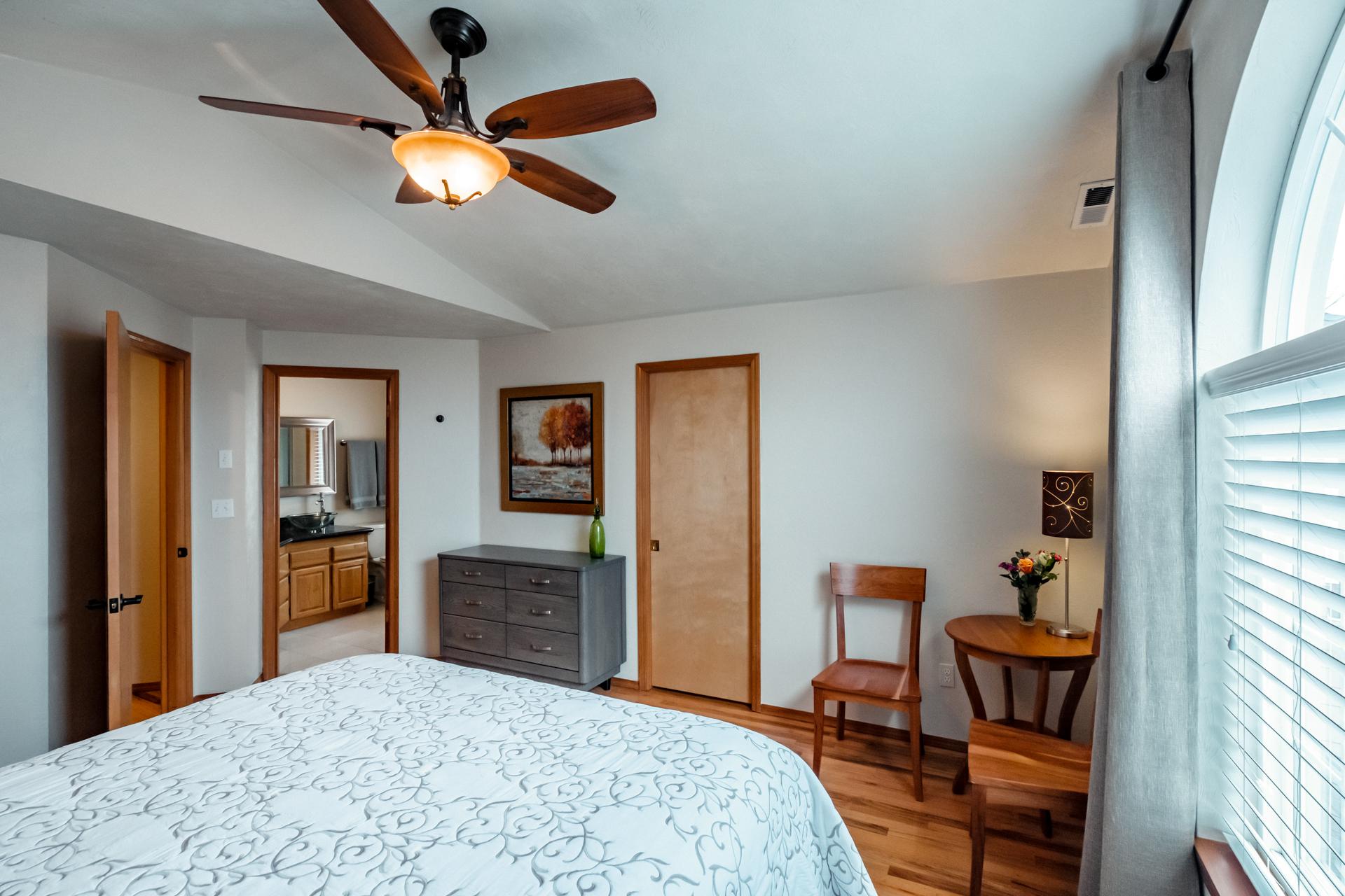 Large space with oversize windows with room darkening drapes.