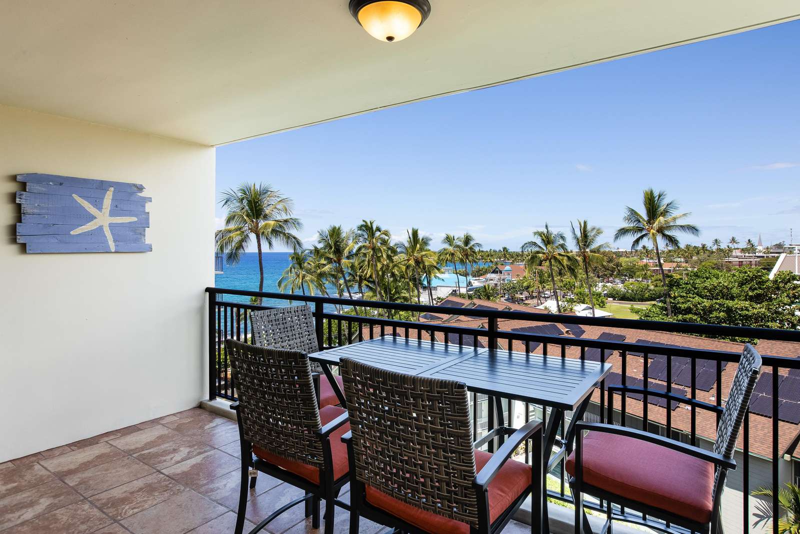 Spacious lanai with ocean and village views.
