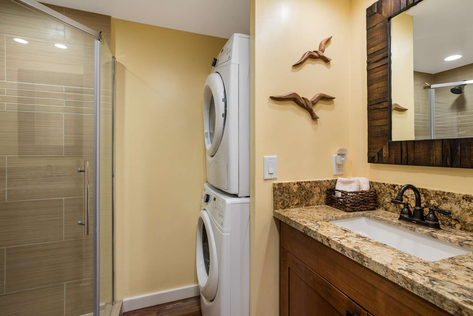 Guest bath with shower and full size washer/dryer.