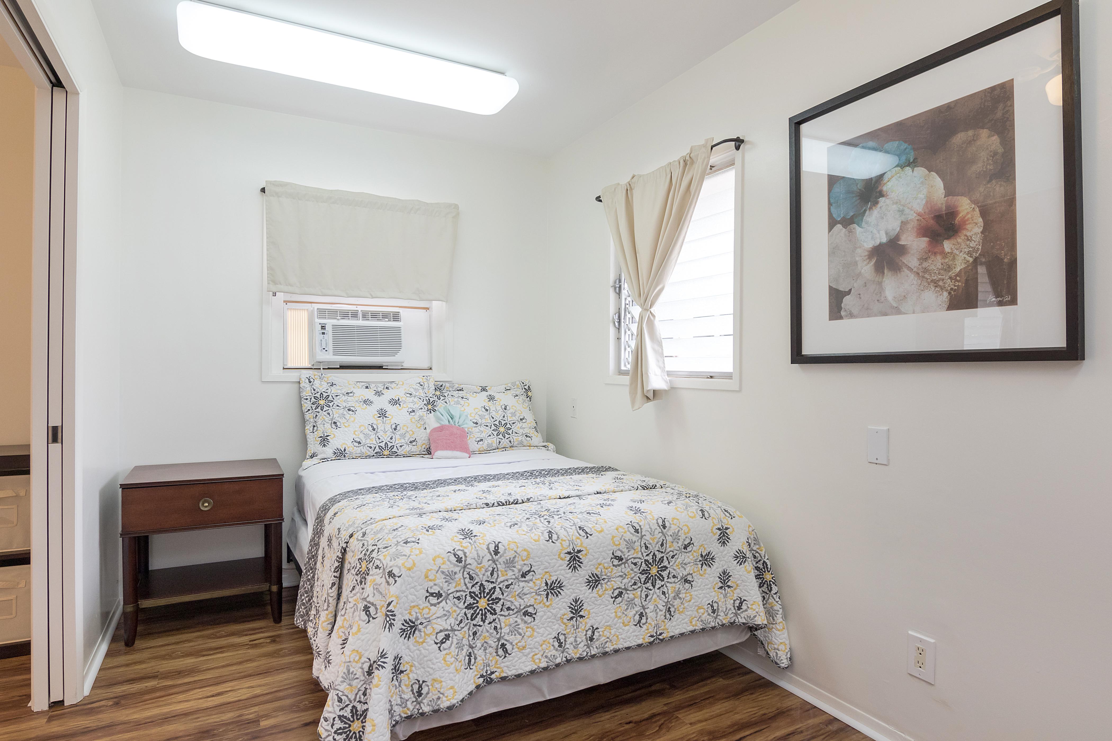 Bedroom B with lockable pocket door connecting to Master bedroom